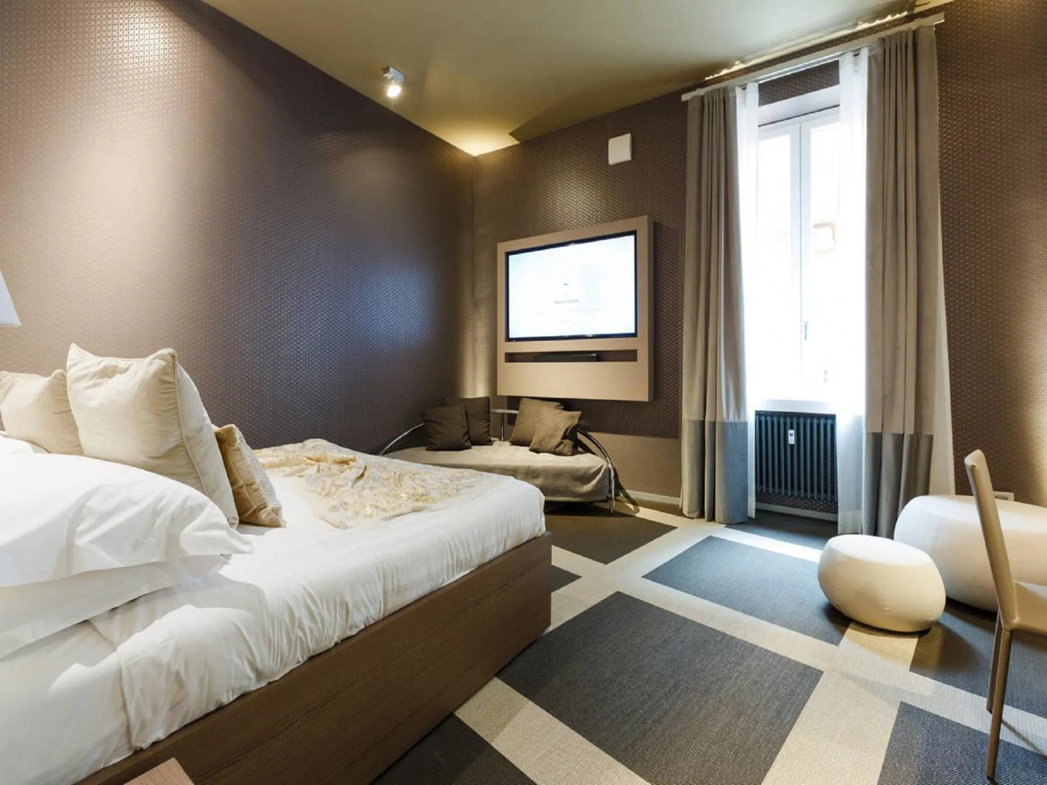 Bed in Private Luxury Suites