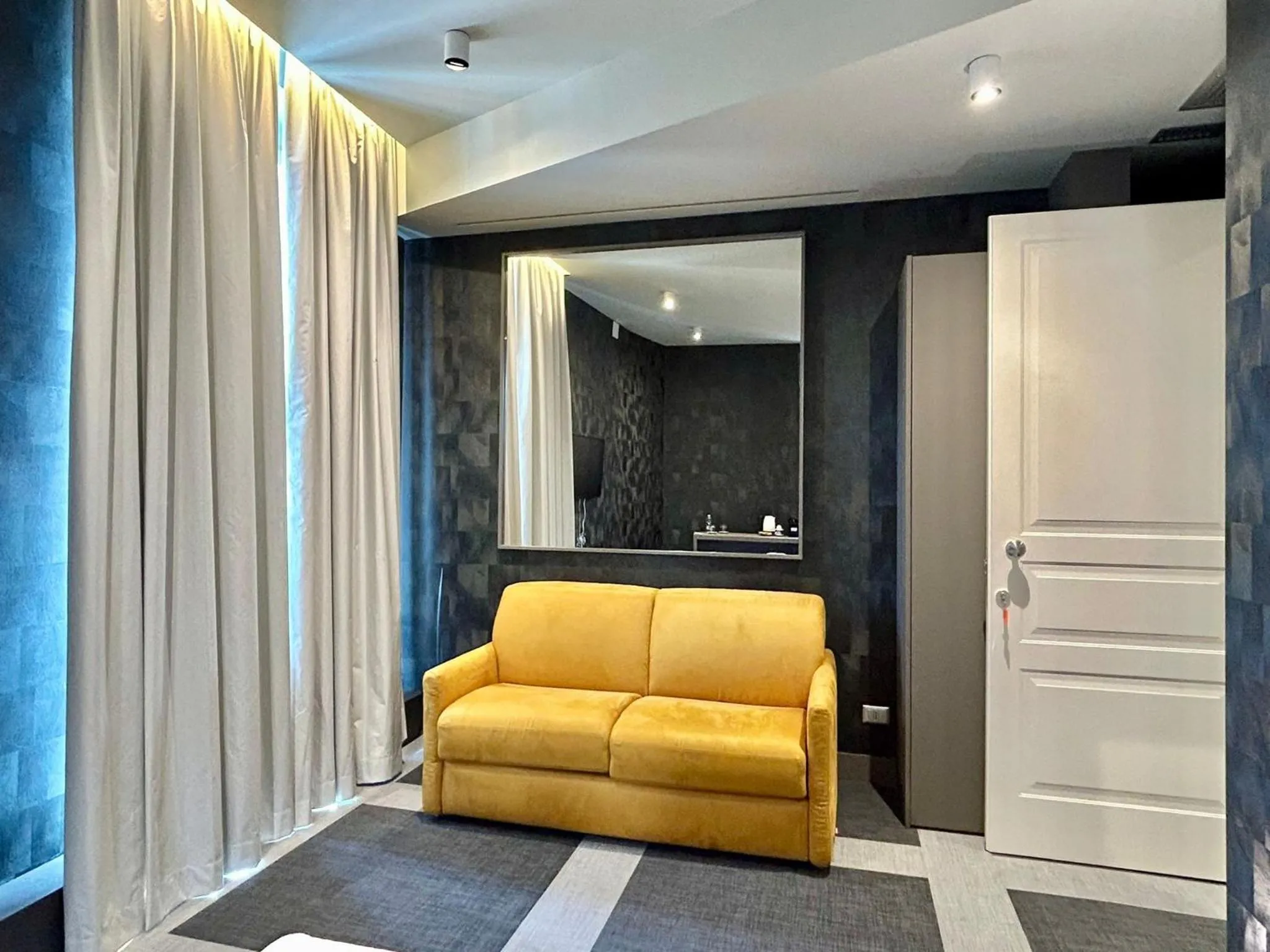 Seating area in Private Luxury Suites