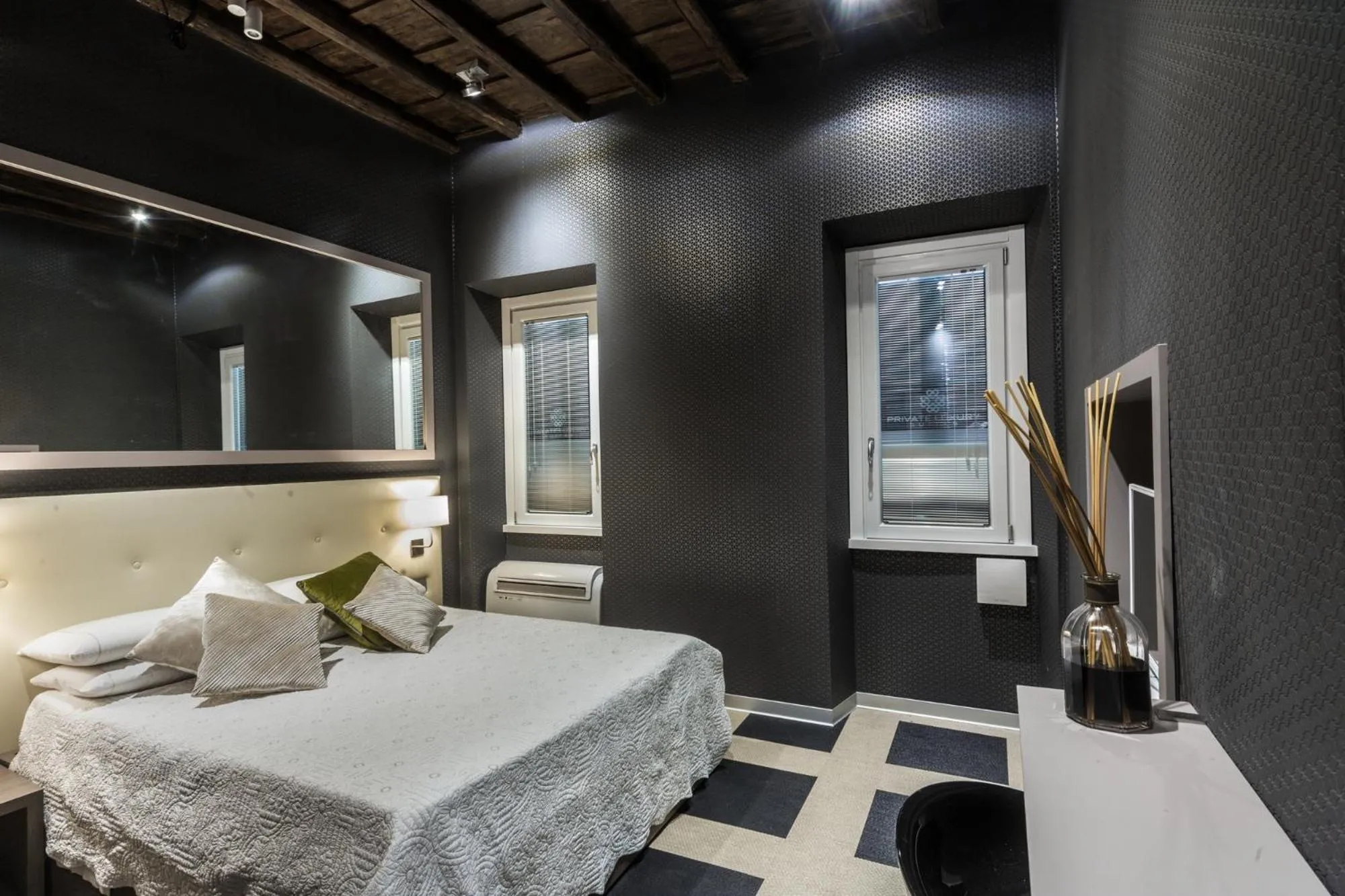 Bed in Private Luxury Suites