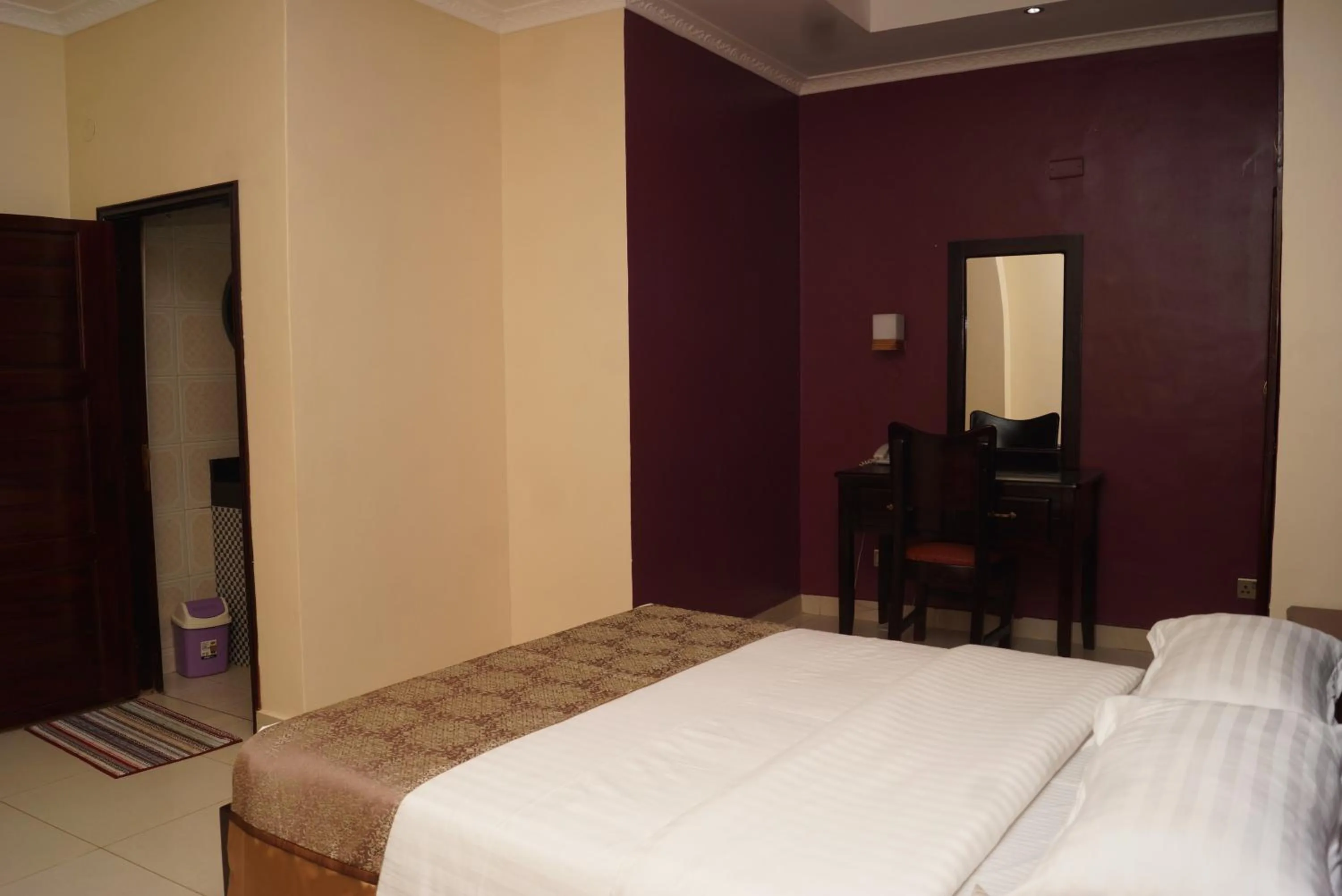 Bed in Diamonds Hotel Kampala