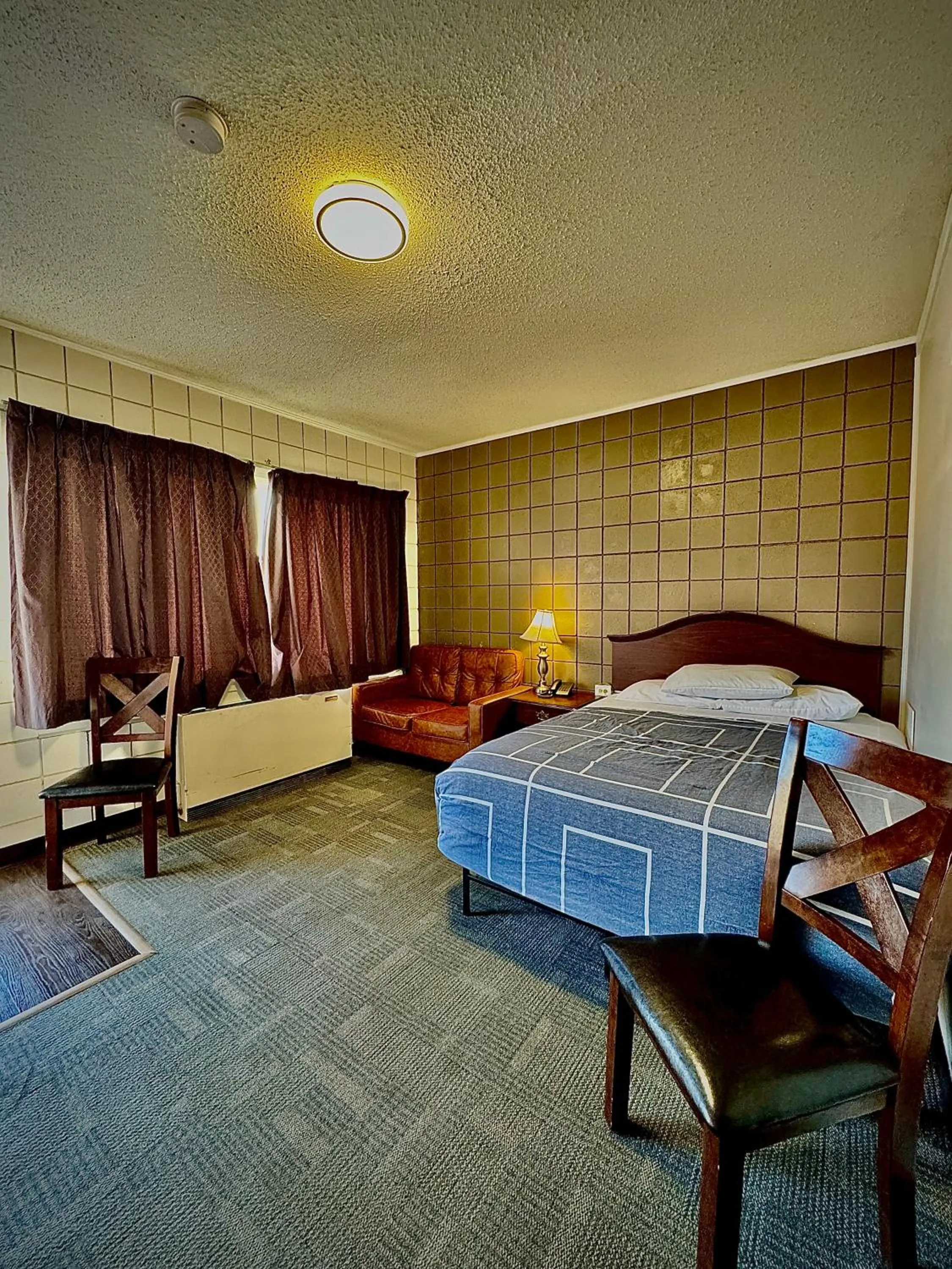 Bed in Caravel Motel