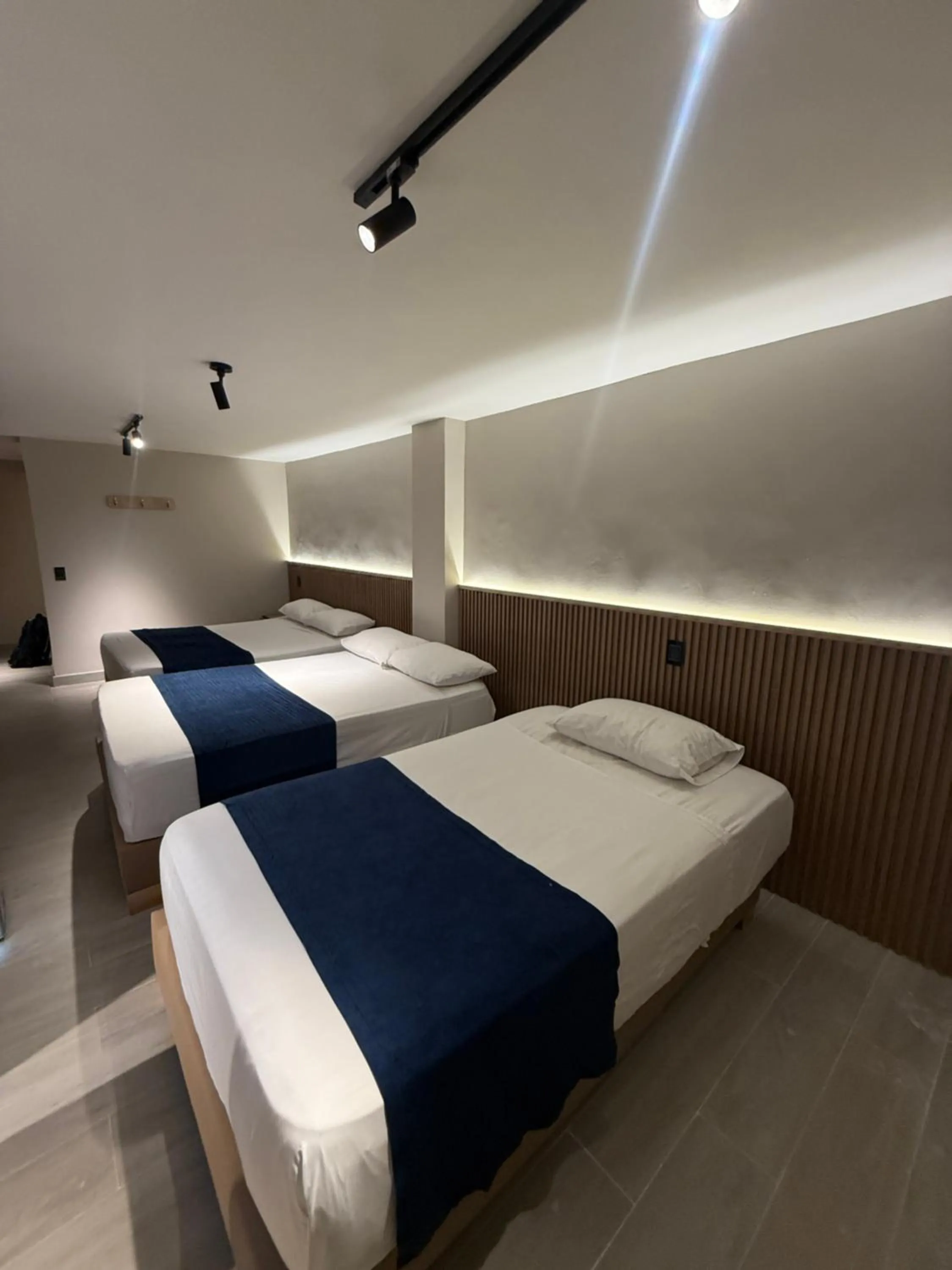 Bed in Hotel Suramericana