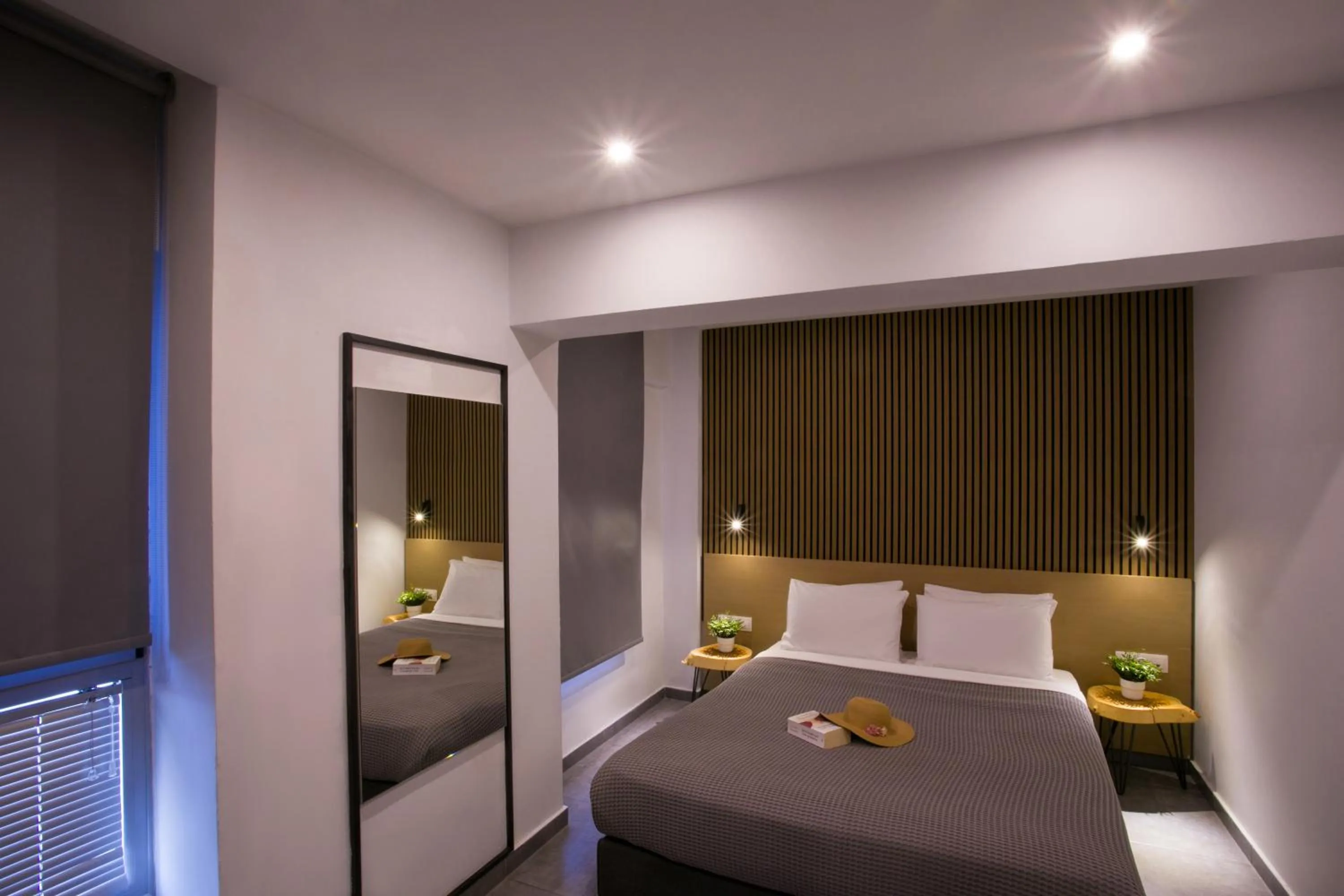 Photo of the whole room, Bed in White Luxury