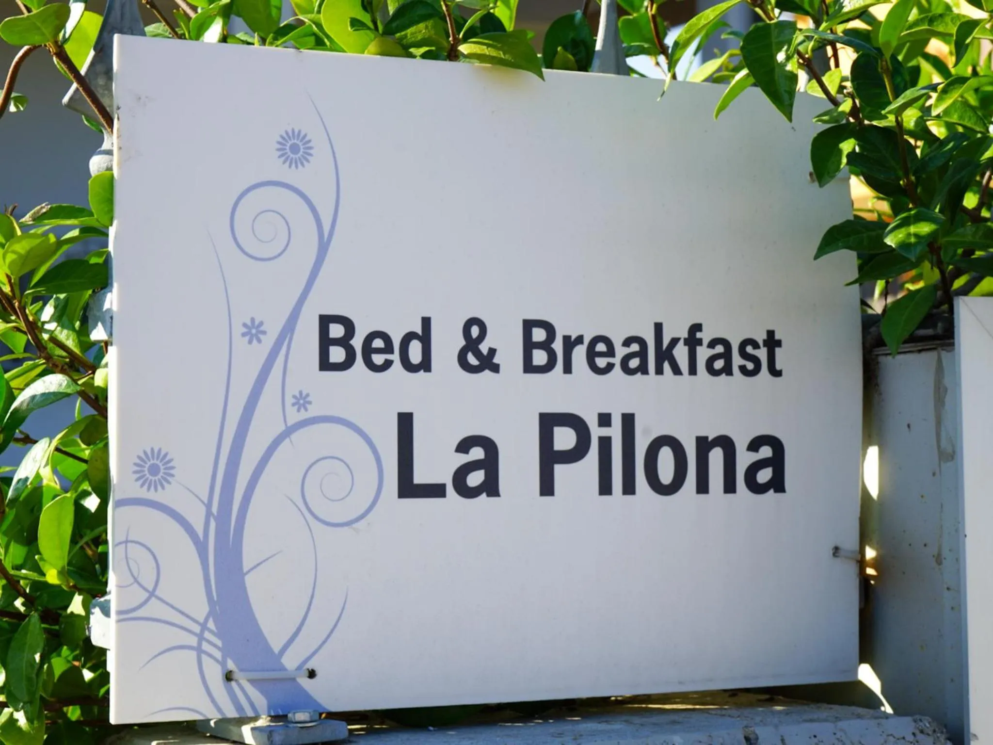 Property logo or sign in Bed & Breakfast La Pilona