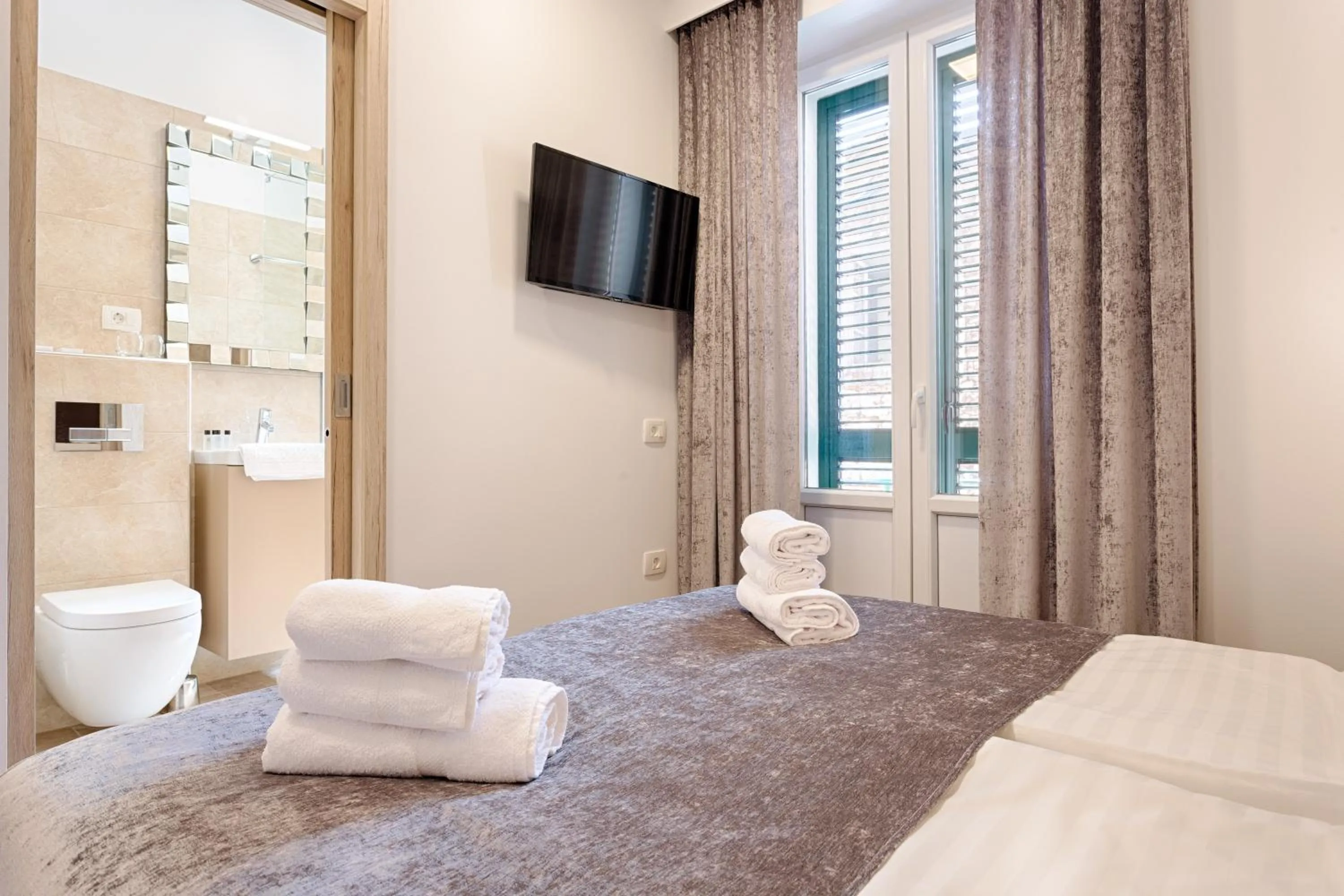 Bedroom, Bed in Central Pearl by Nono Ban Rooms