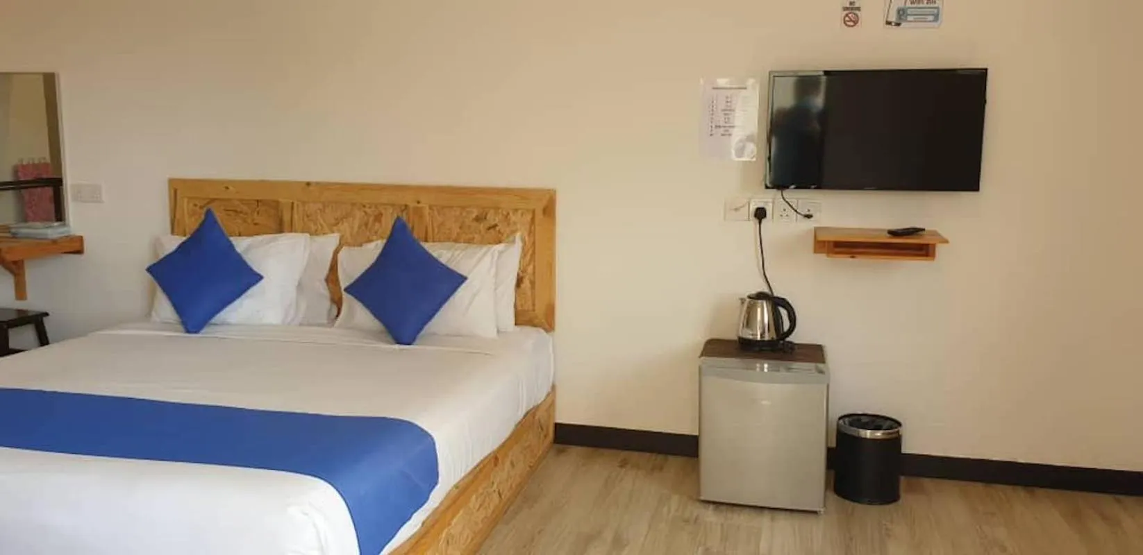 Bed in Paretto Seaview Hotel