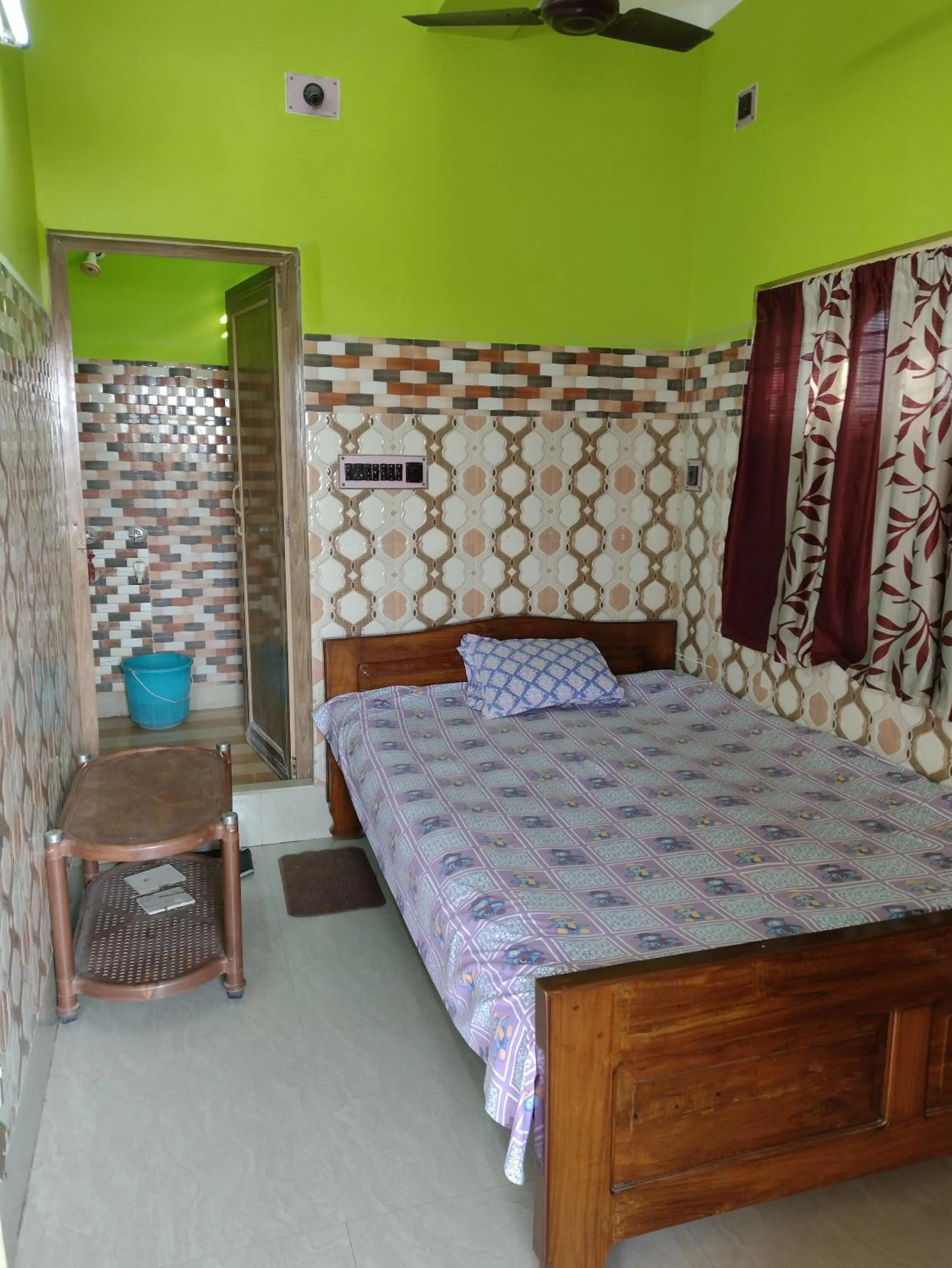Bed in Jagannath Guest House