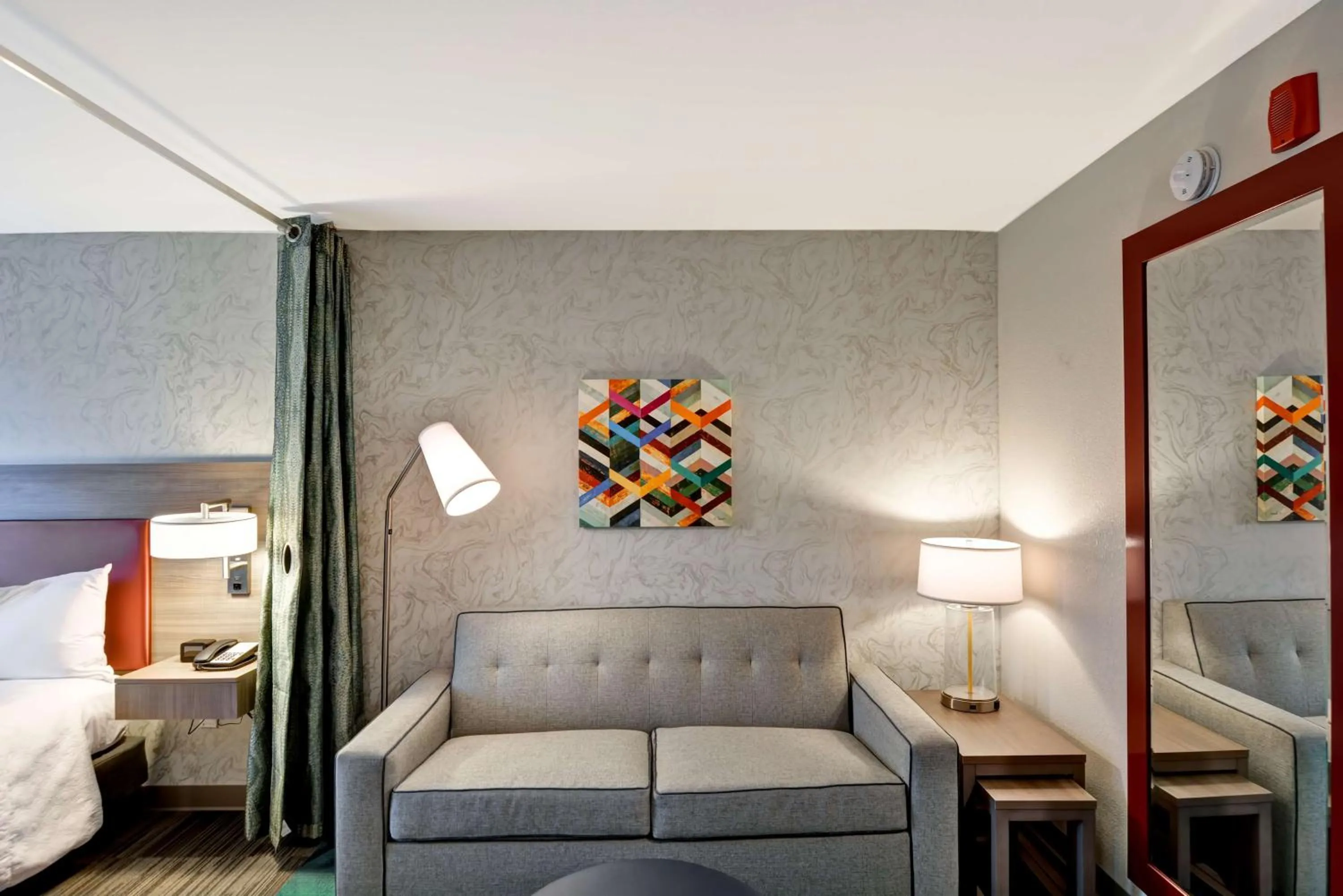 Living room, Bed in Home2 Suites By Hilton Tampa USF Near Busch Gardens