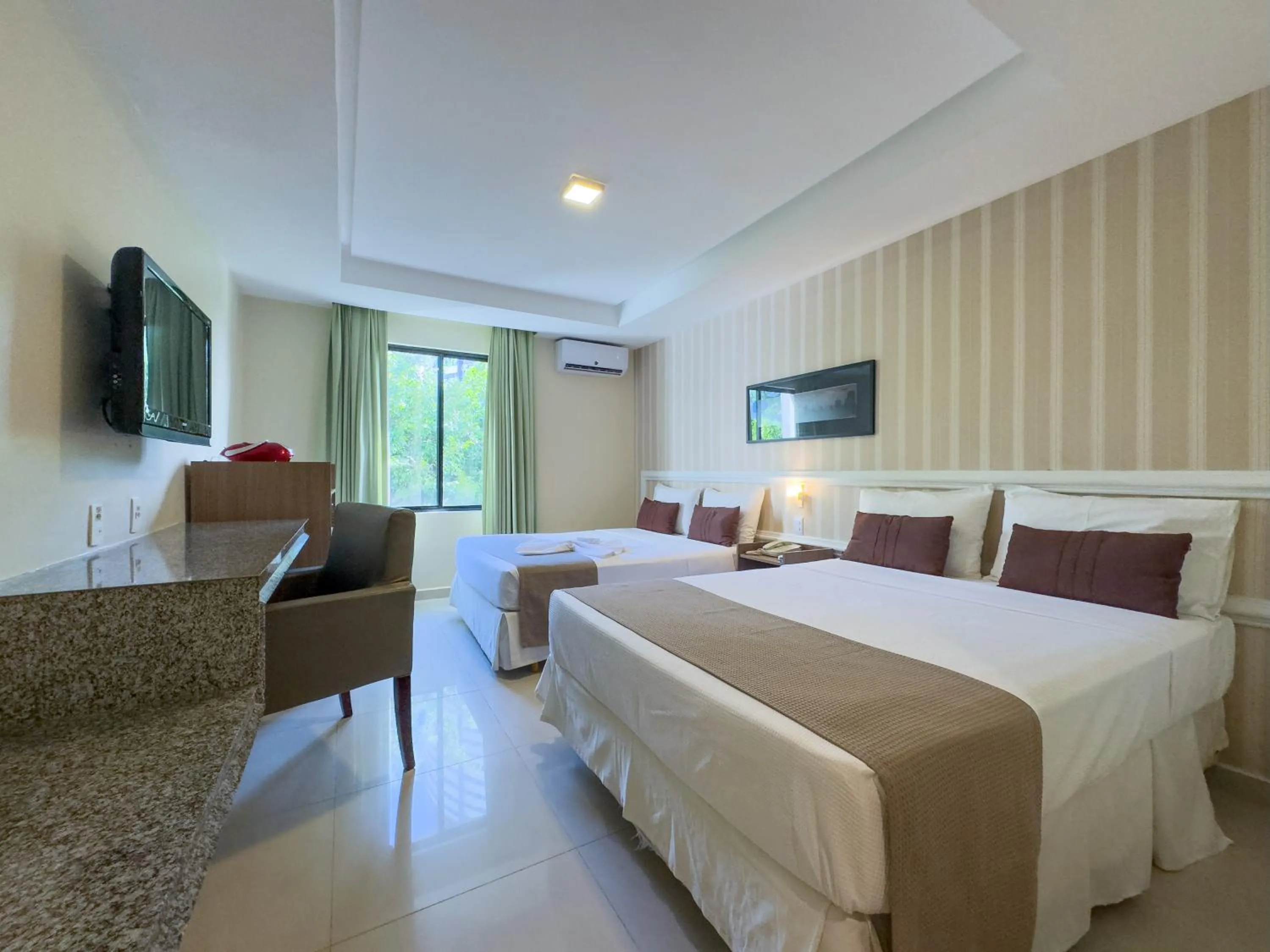 Bed in Arituba Park Hotel