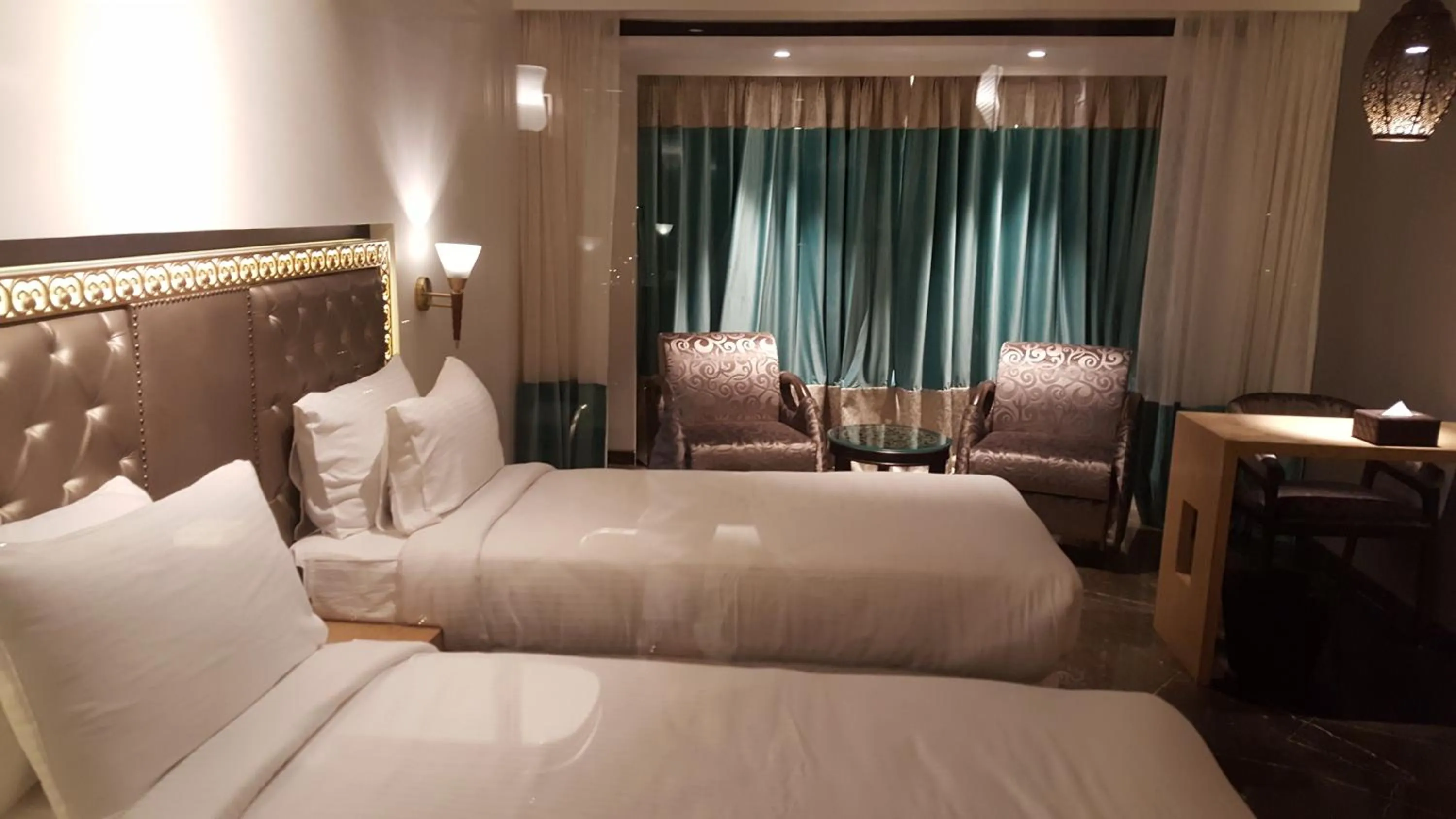 Bed in Hotel Peninsula Redpine