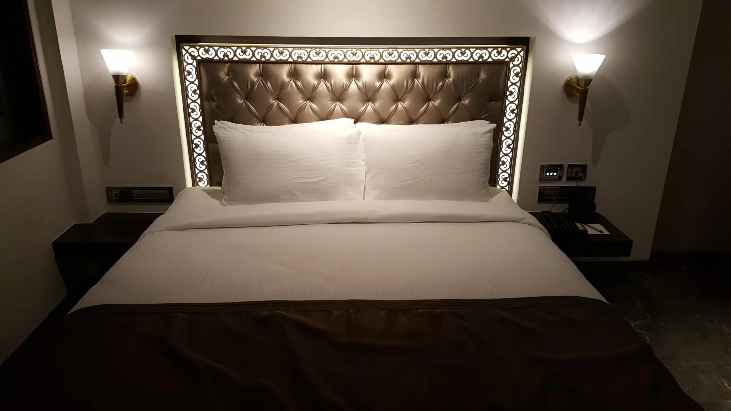 Bed in Hotel Peninsula Redpine