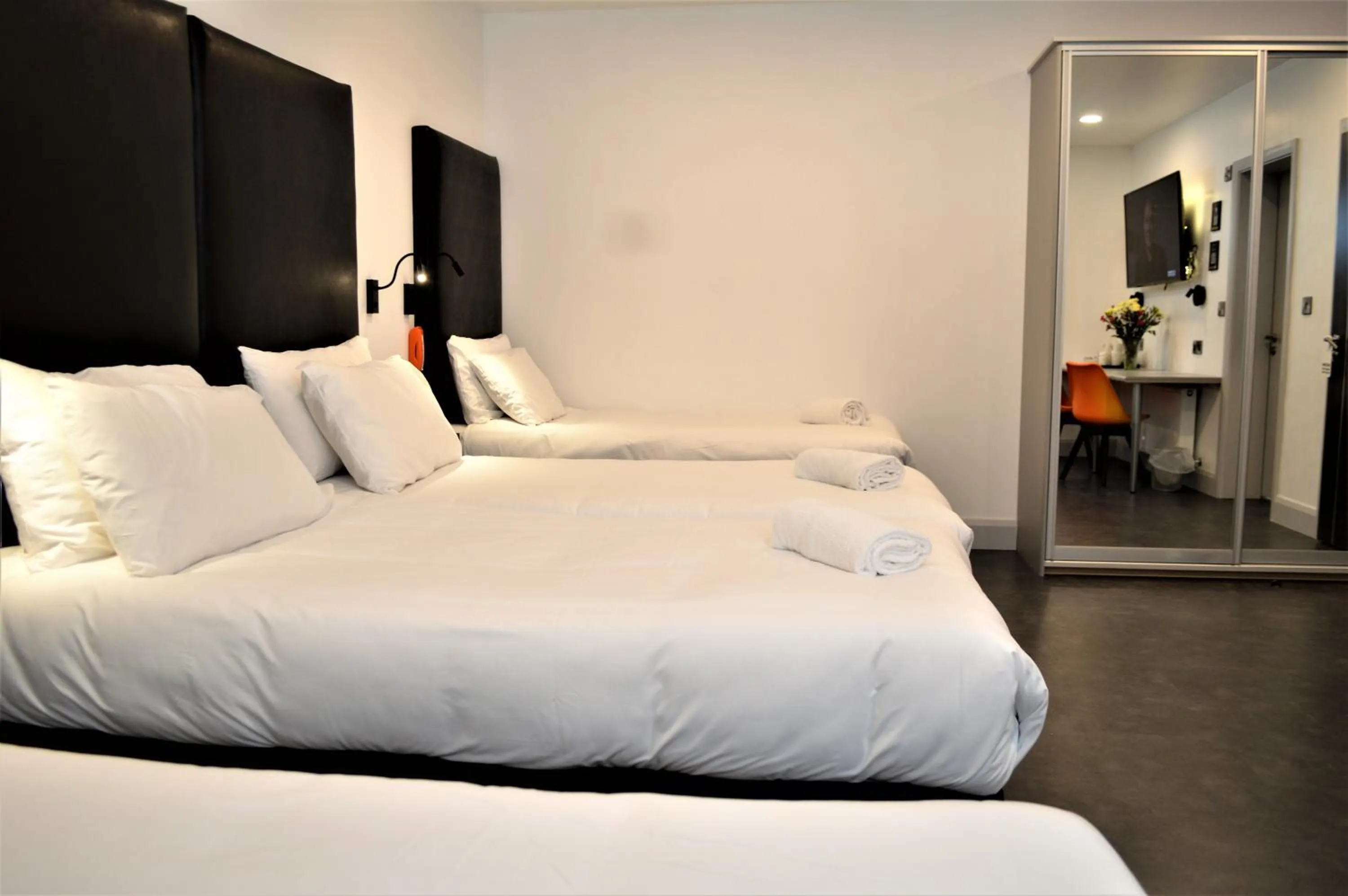 Bed in Bella Vista Hotel & Self Catering Suites