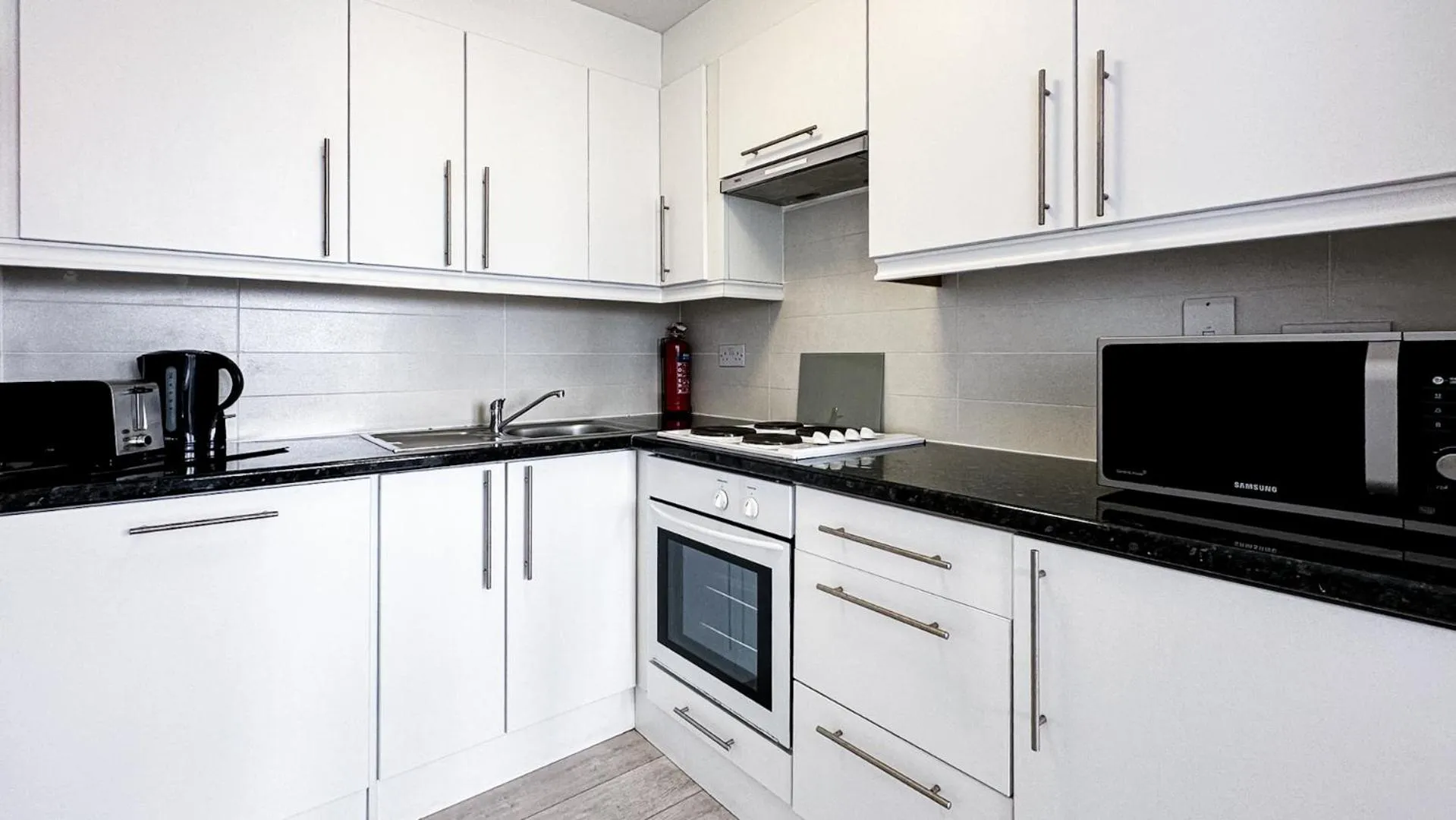 Kitchen or kitchenette in Bella Vista Hotel & Self Catering Suites