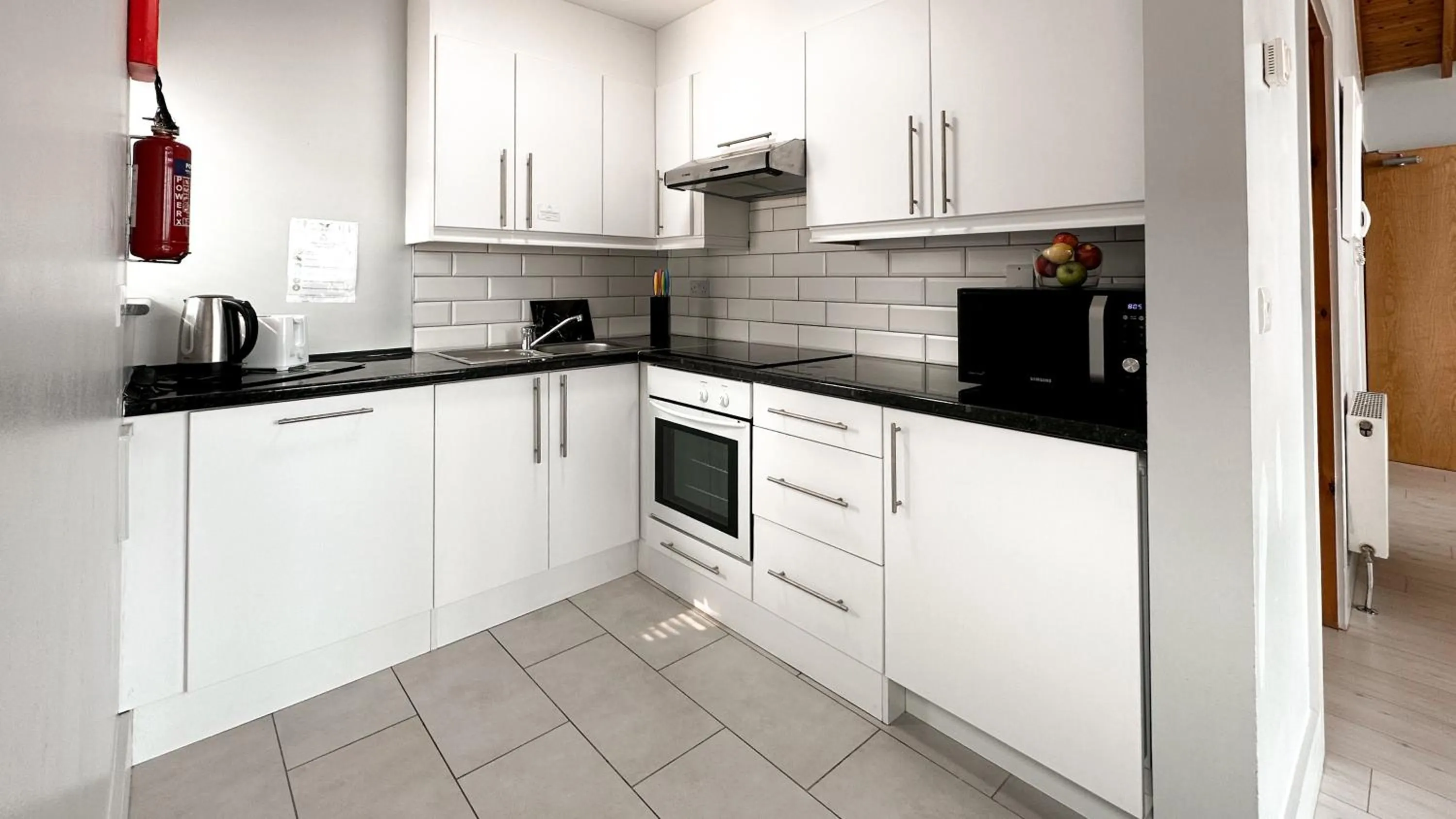 Kitchen or kitchenette in Bella Vista Hotel & Self Catering Suites