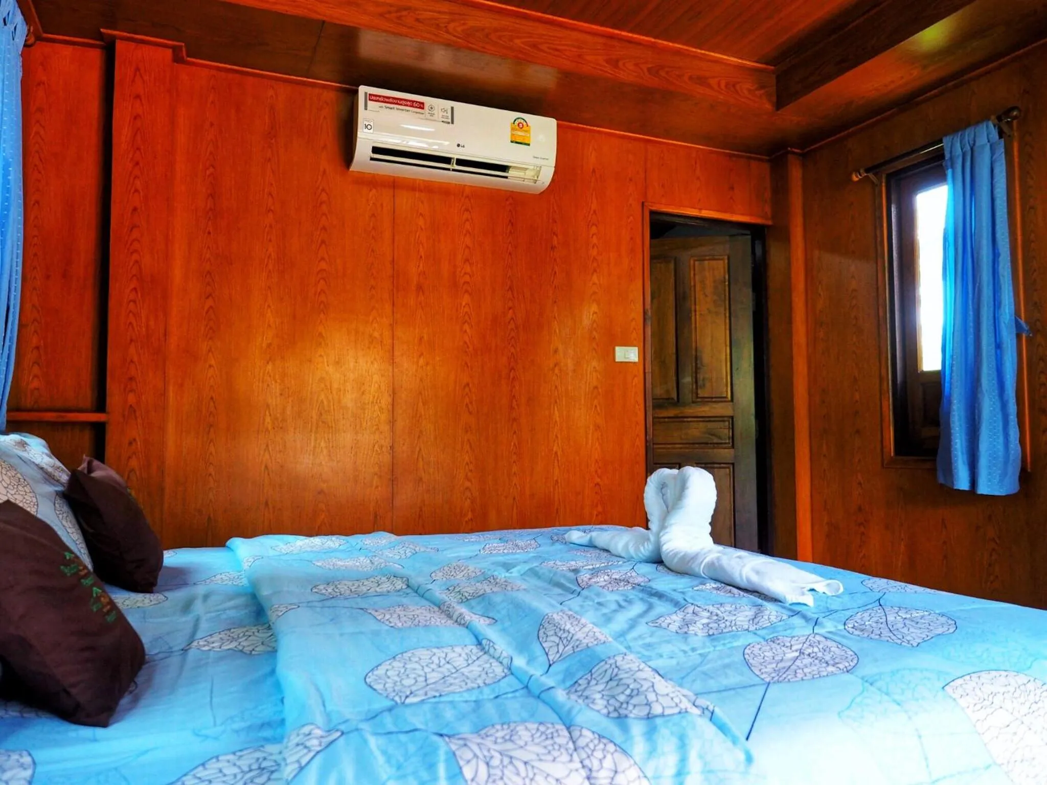 Bed in Baansuan Resort