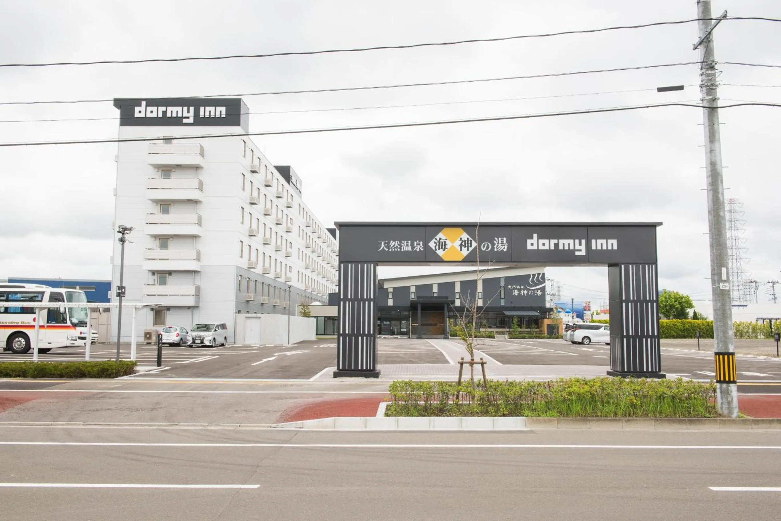 Property logo or sign in Dormy Inn EXPRESS Sendai Seaside