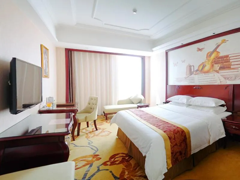 Bed in Vienna International Hotel Maoming Xinyi Xinshang Road