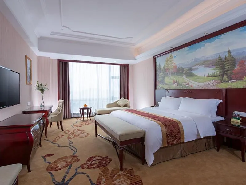 Bed in Vienna International Hotel Maoming Xinyi Xinshang Road