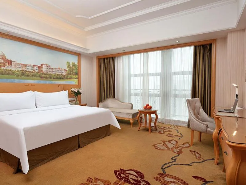 Bed in Vienna International Hotel Jiujiang Shili Street