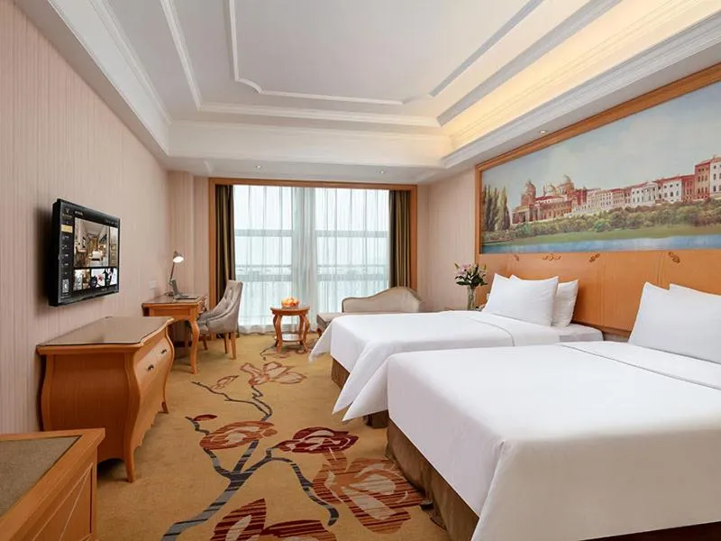 Bed in Vienna International Hotel Jiujiang Shili Street