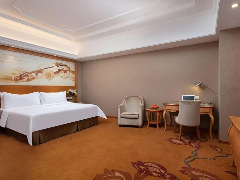 Bed in Vienna International Hotel Jiujiang Shili Street