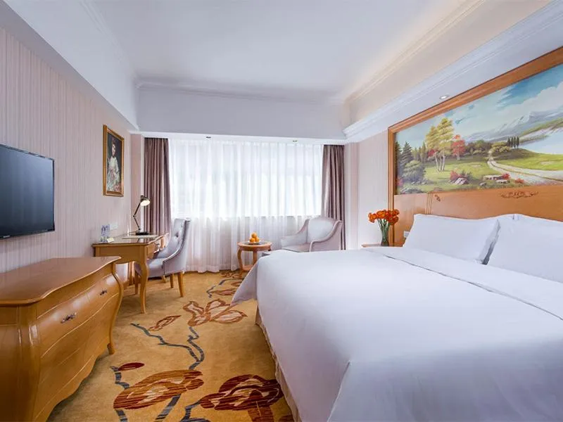 Bed in Vienna Hotel Shenzhen Lo Wu Control Point
