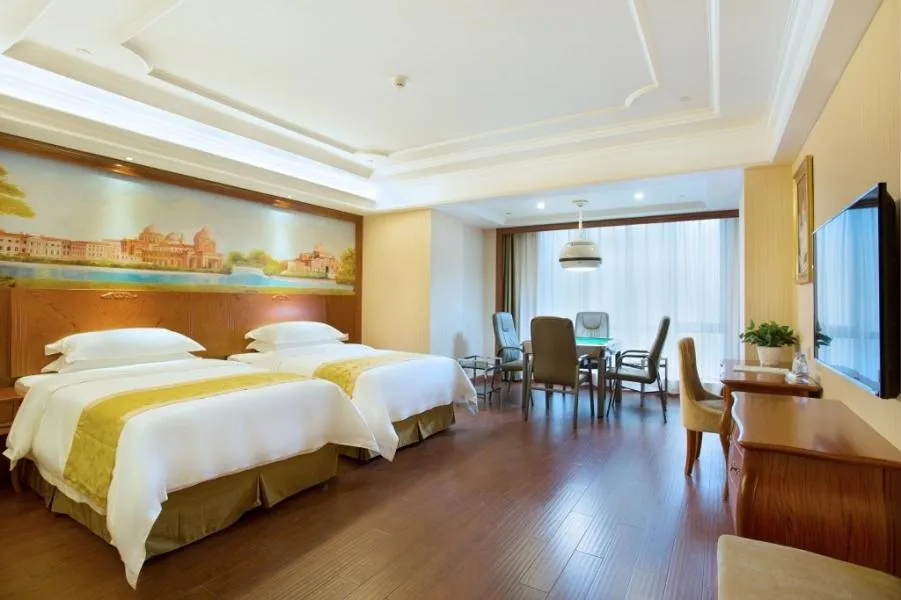 Bed in Vienna International Hotel Changsha Hongxing