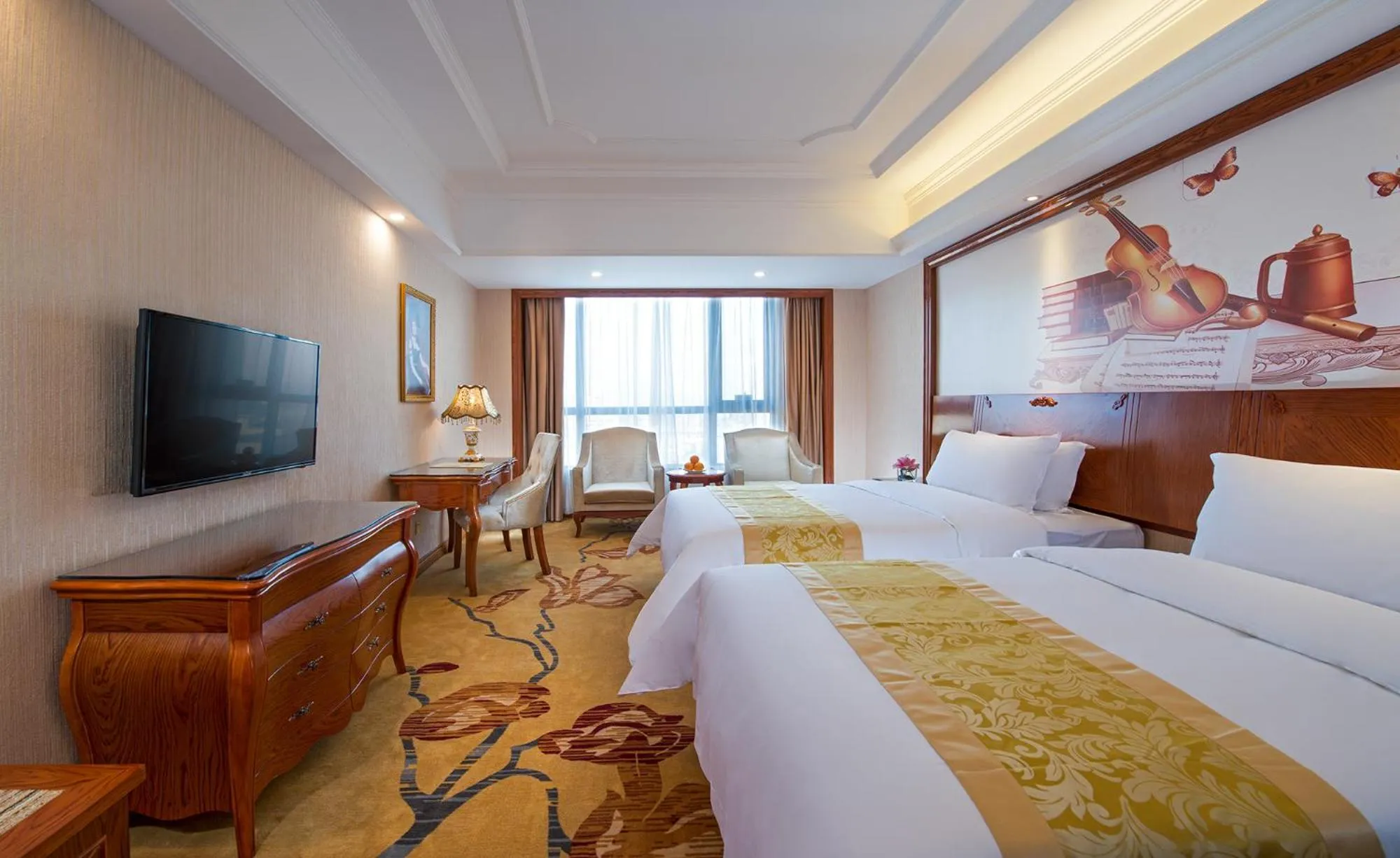 Bed in Vienna International Hotel Jieyang Yangmei Jade hotel