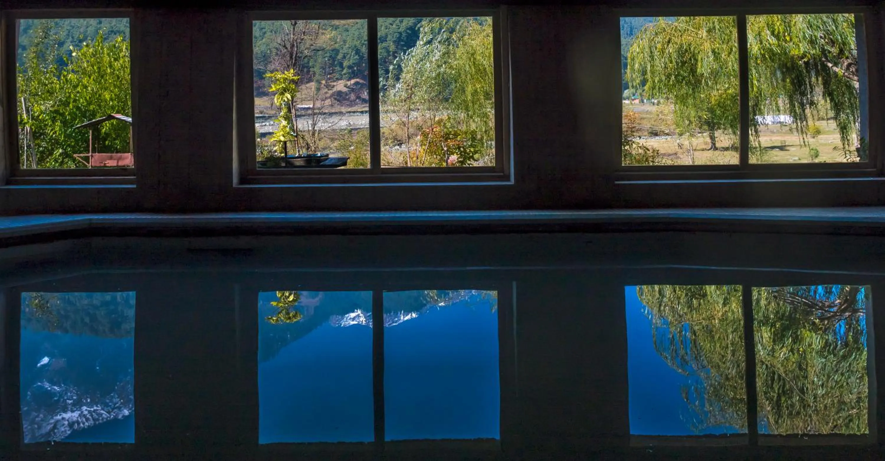 Swimming pool in Pahalgam Hotel Riverside Luxury