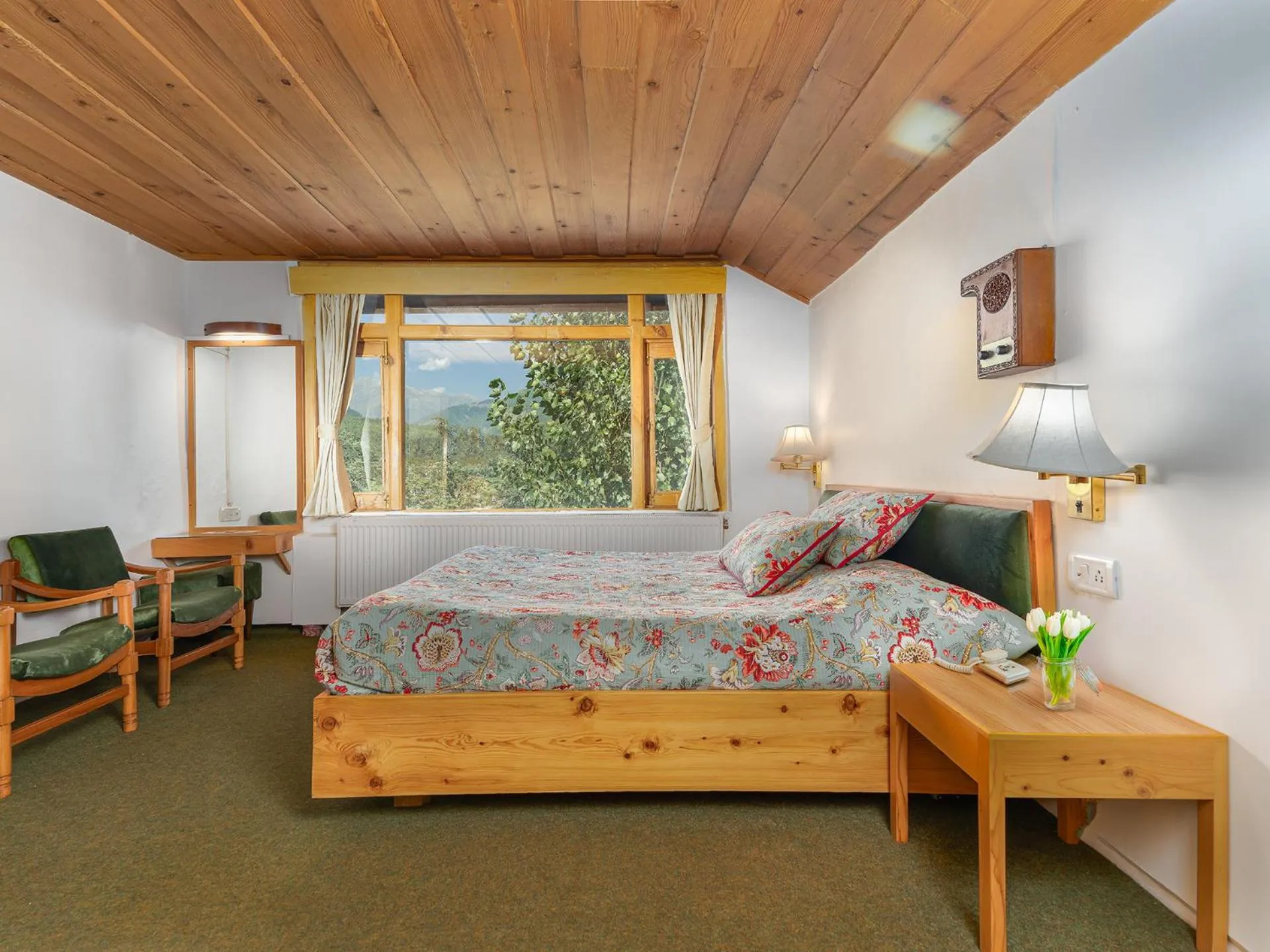 Bed in Pahalgam Hotel Riverside Luxury