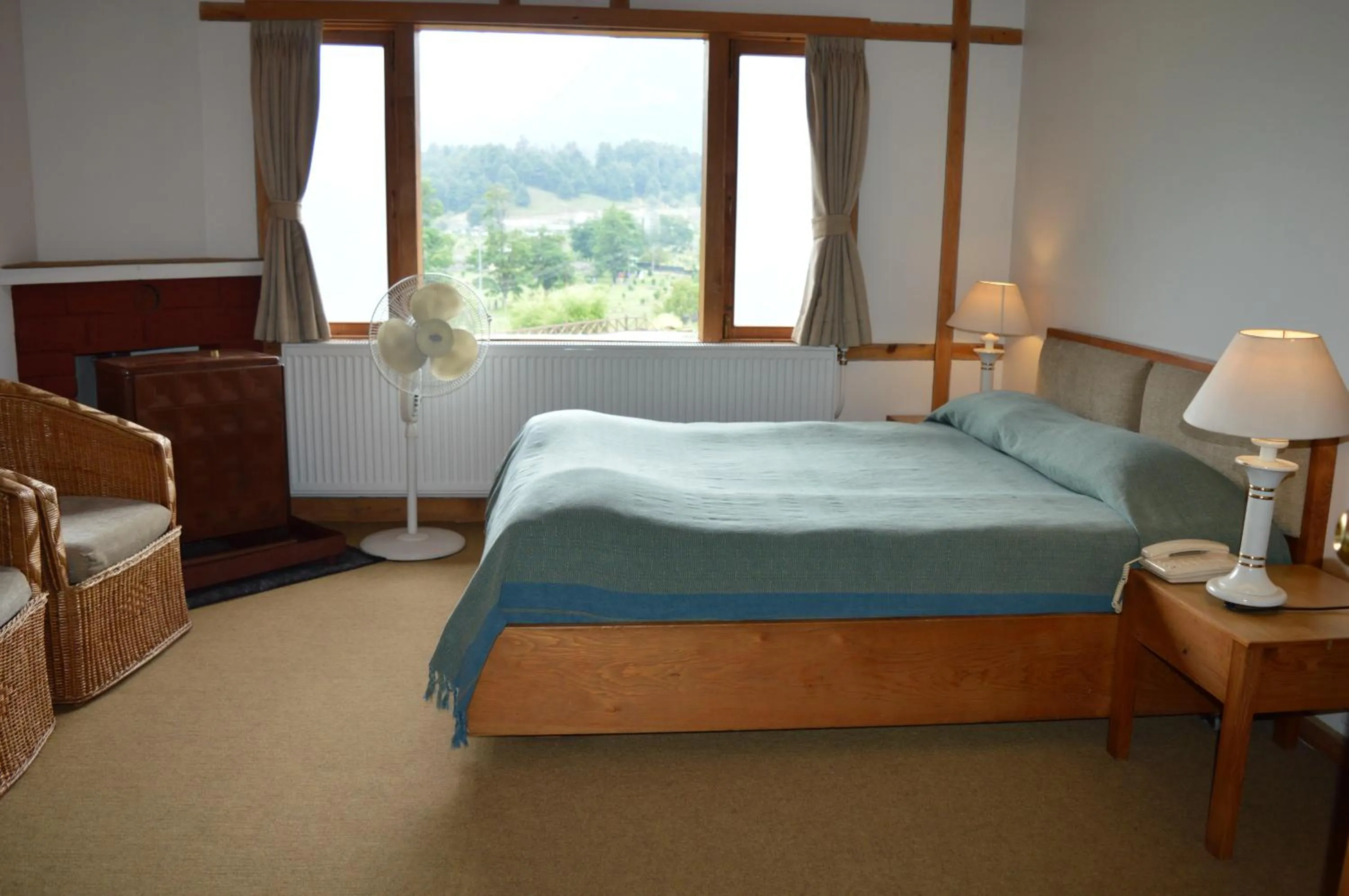 Bed in Pahalgam Hotel Riverside Luxury