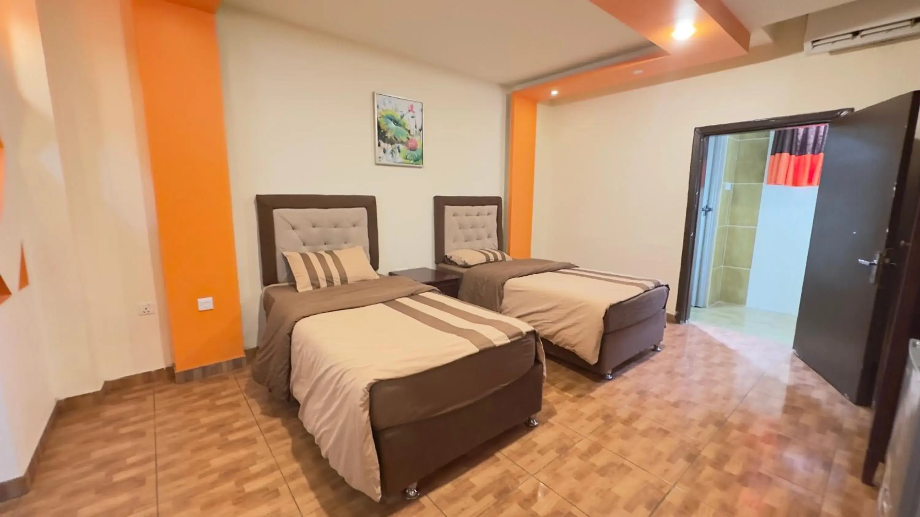 Deluxe Room (2 Adults + 1 Child) in Al Riyati Hotel Apartments Deluxe Room (2 Adults + 1 Child) in Al Riyati Hotel Apartments