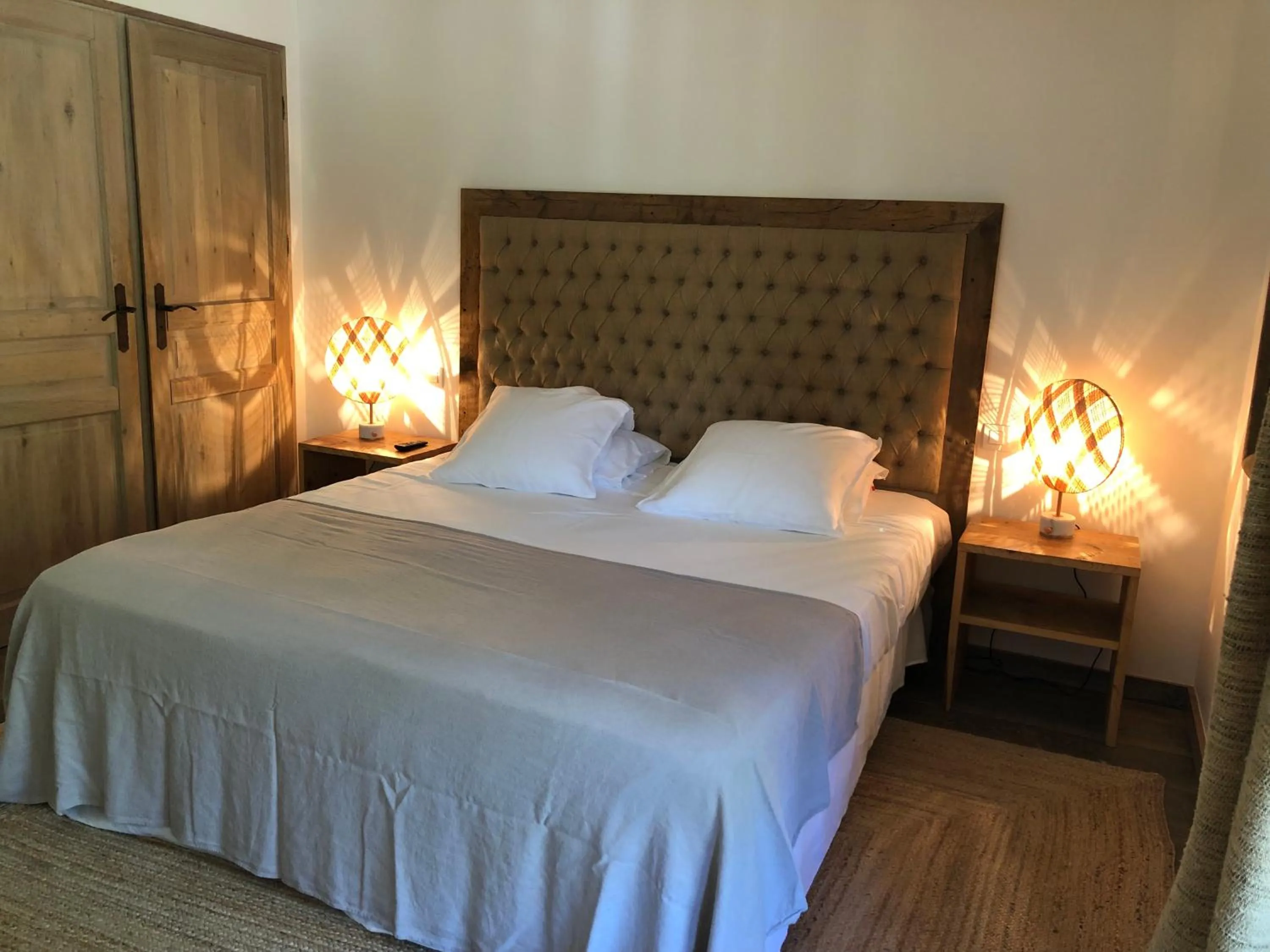 Bed in Le Clos des Sept Palmiers