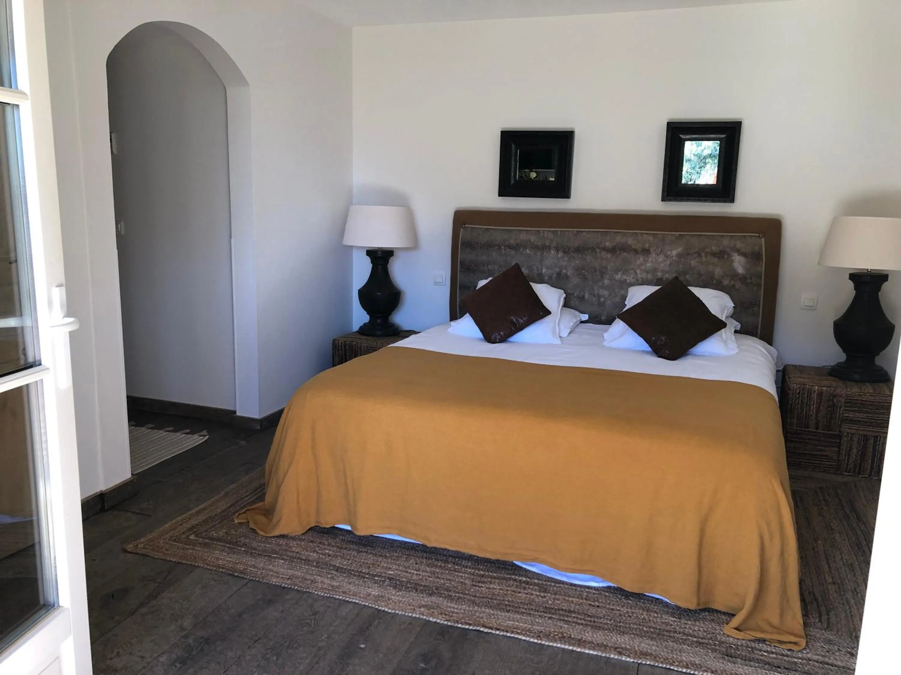 Bed in Le Clos des Sept Palmiers