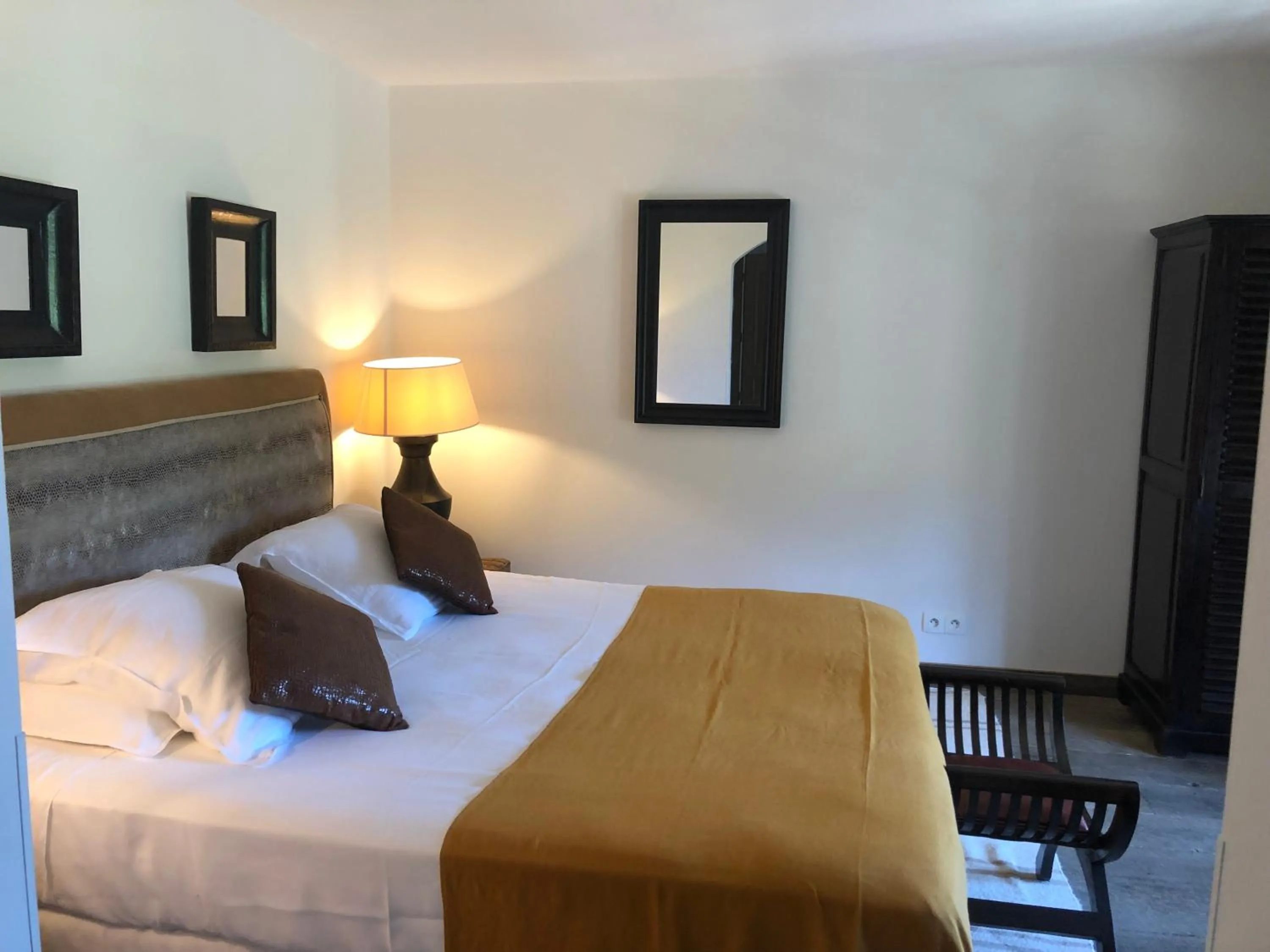 Bed in Le Clos des Sept Palmiers