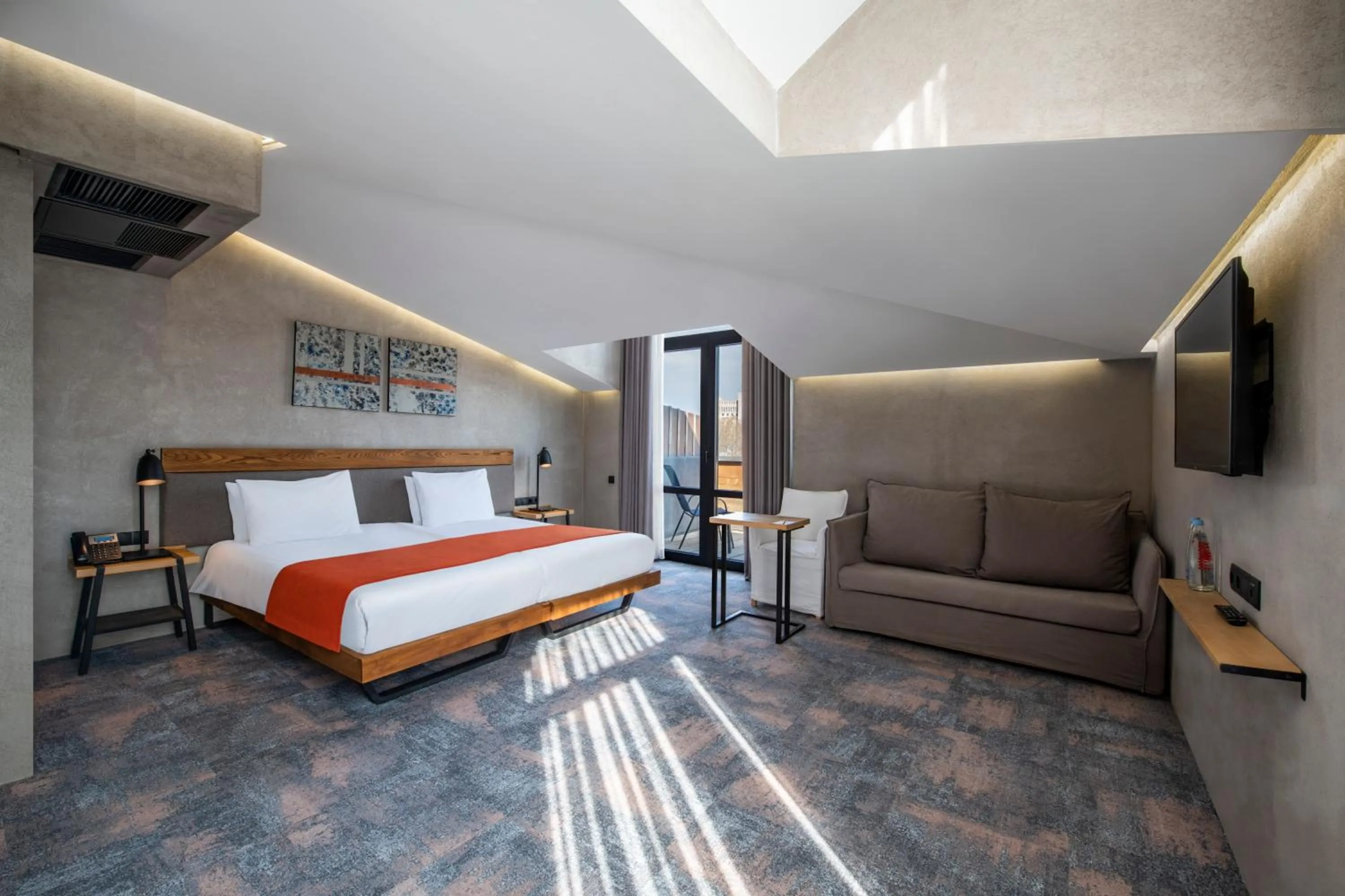 TV and multimedia, Bed in IOTA Hotel Tbilisi