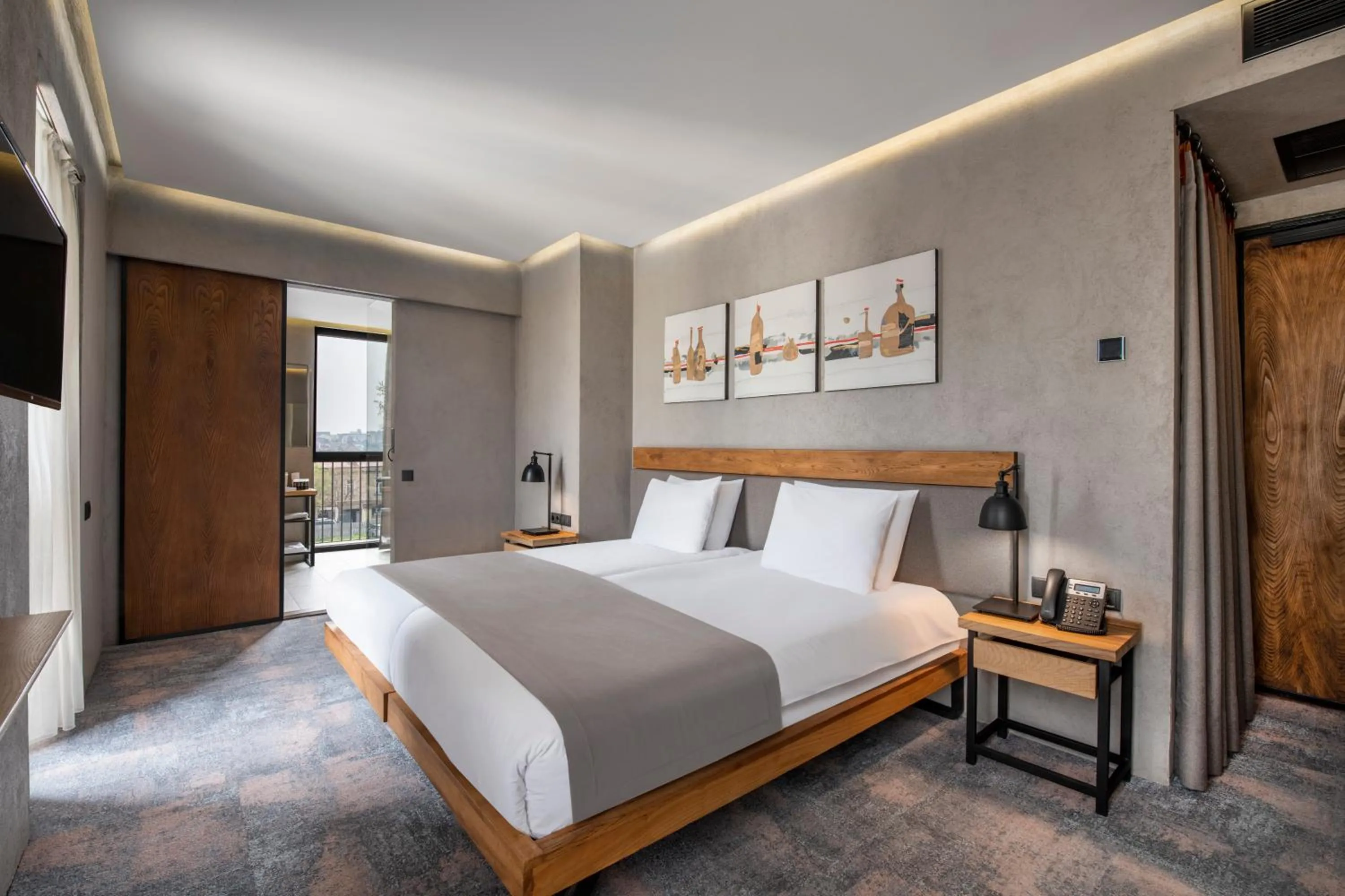 Bed in IOTA Hotel Tbilisi