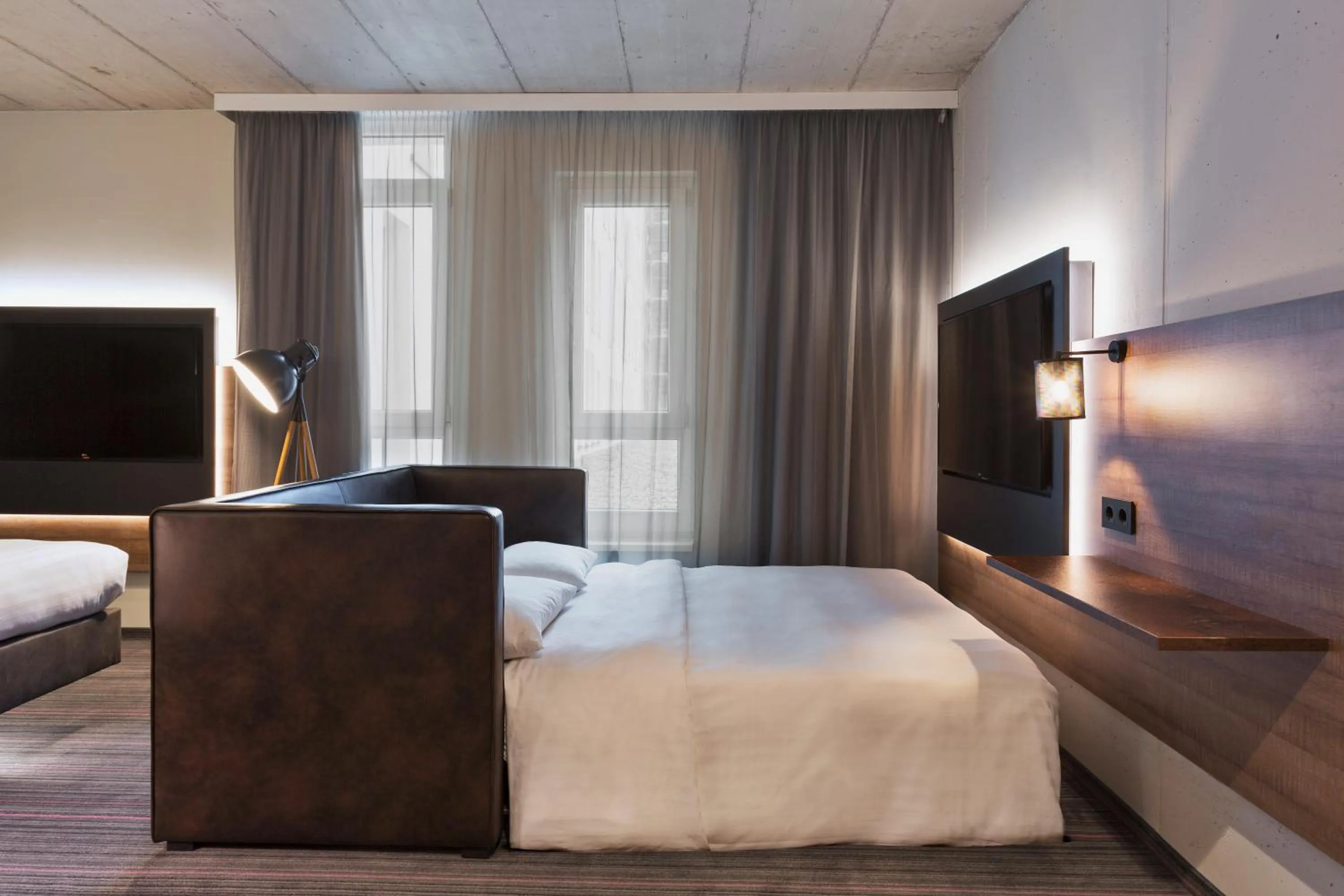 Photo of the whole room, Bed in MOXY Frankfurt East
