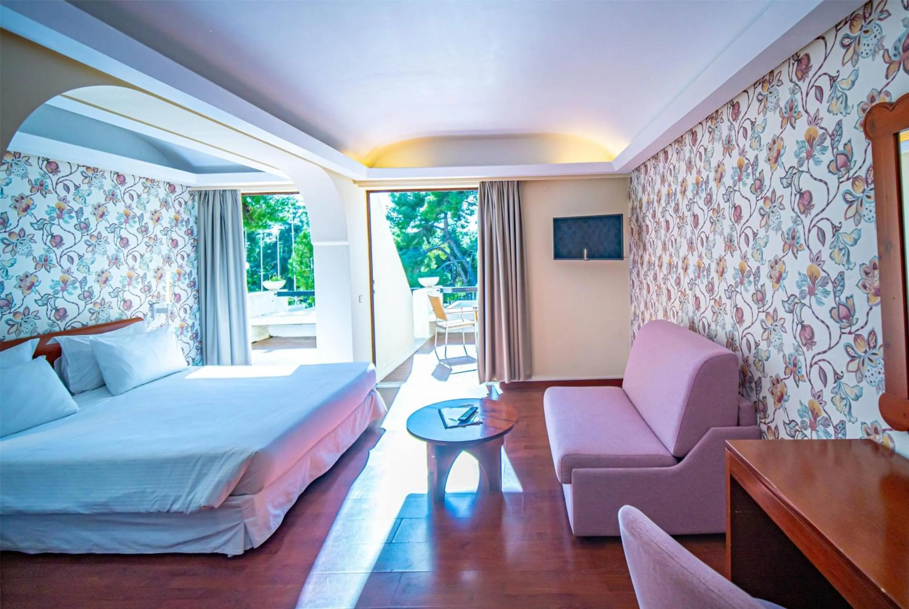 Photo of the whole room, Bed in Ramada Loutraki Poseidon Resort