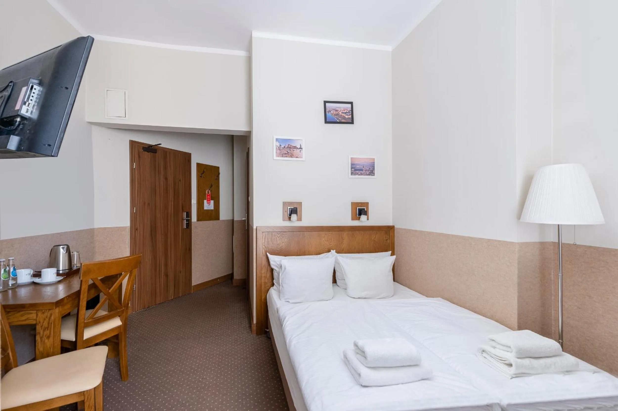 Bed in Daniel Griffin Aparthotel by Artery Hotels