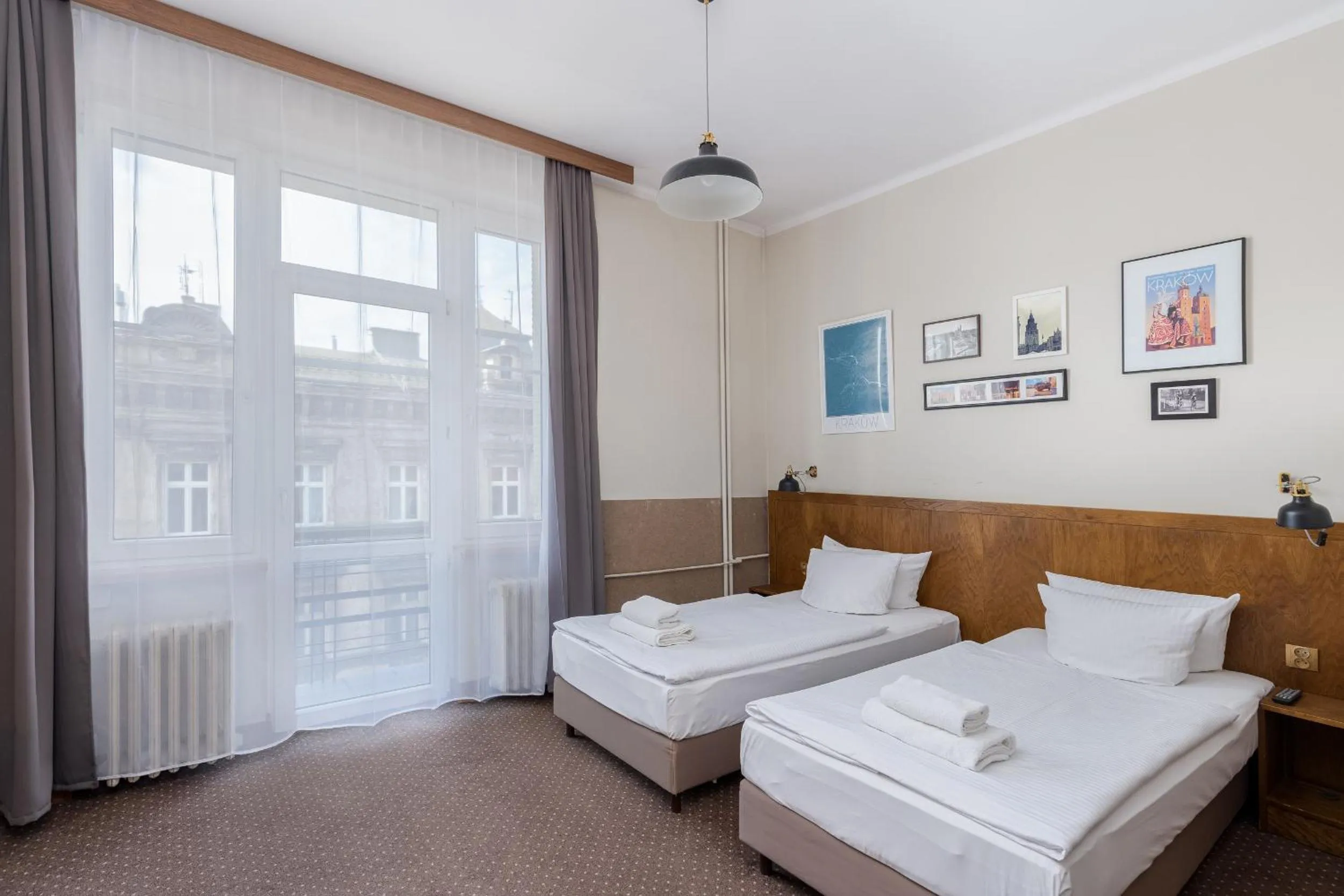 Bed in Daniel Griffin Aparthotel by Artery Hotels