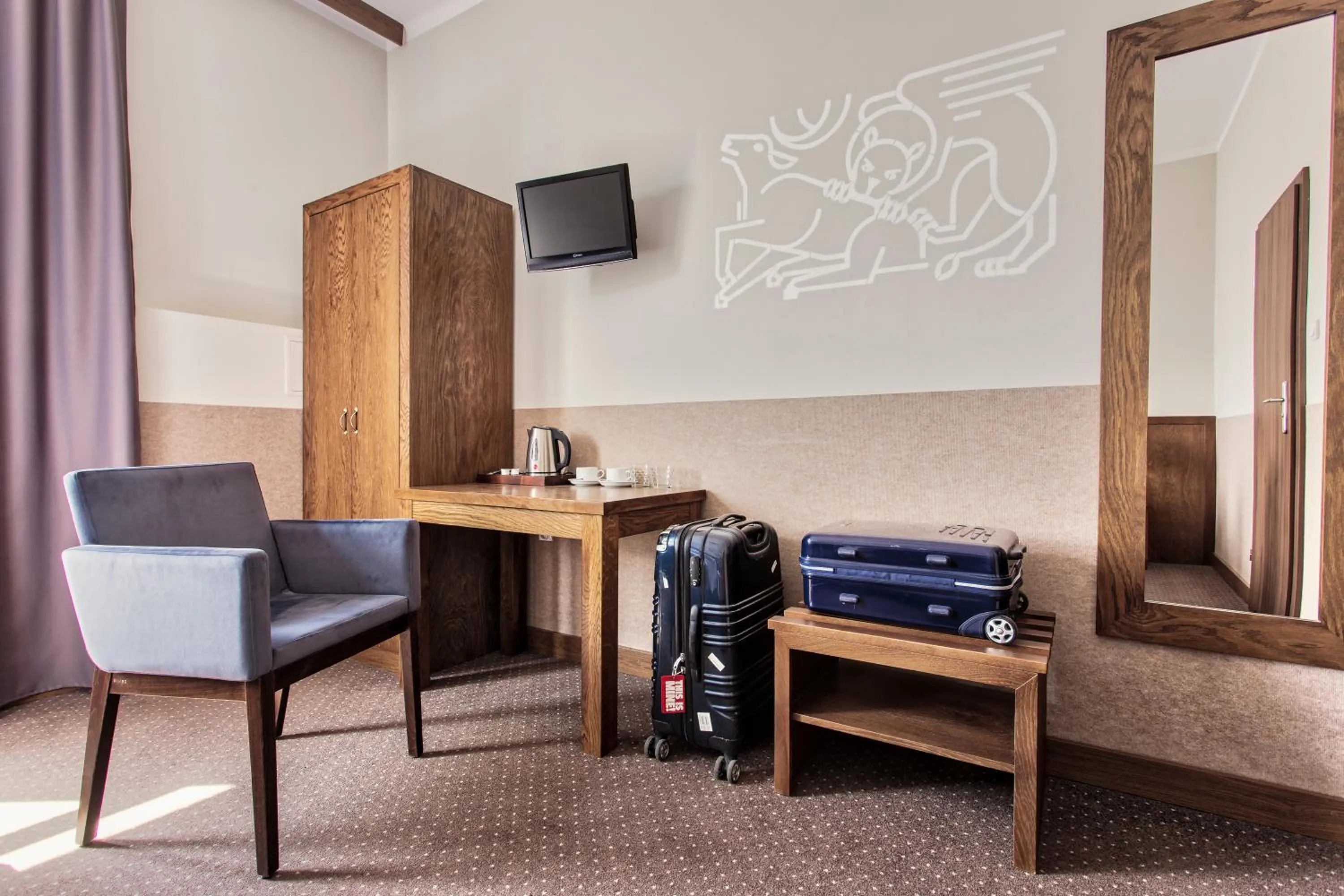 Seating area in Daniel Griffin Aparthotel by Artery Hotels