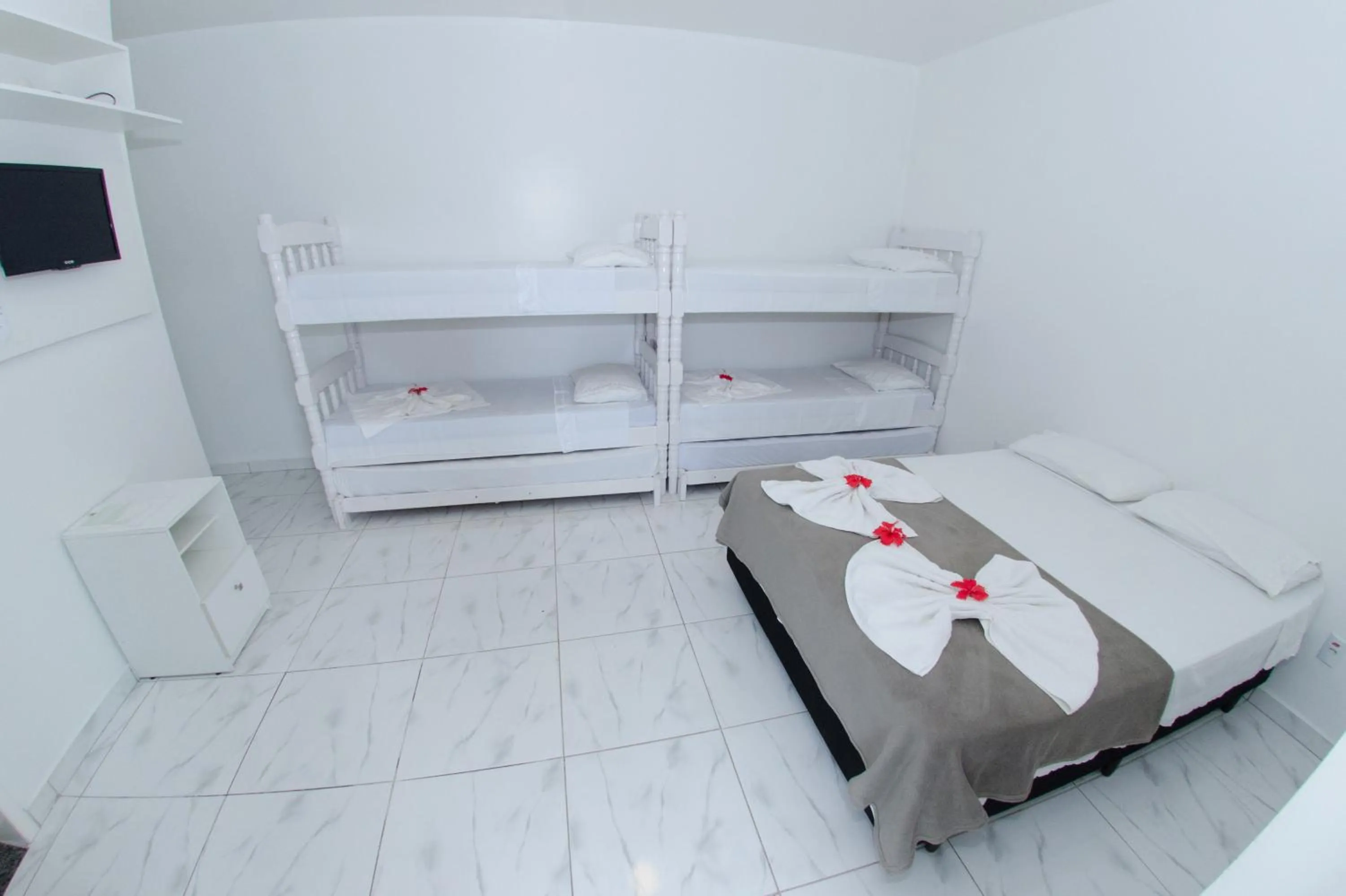 Bed in Pousada Nascer do Sol