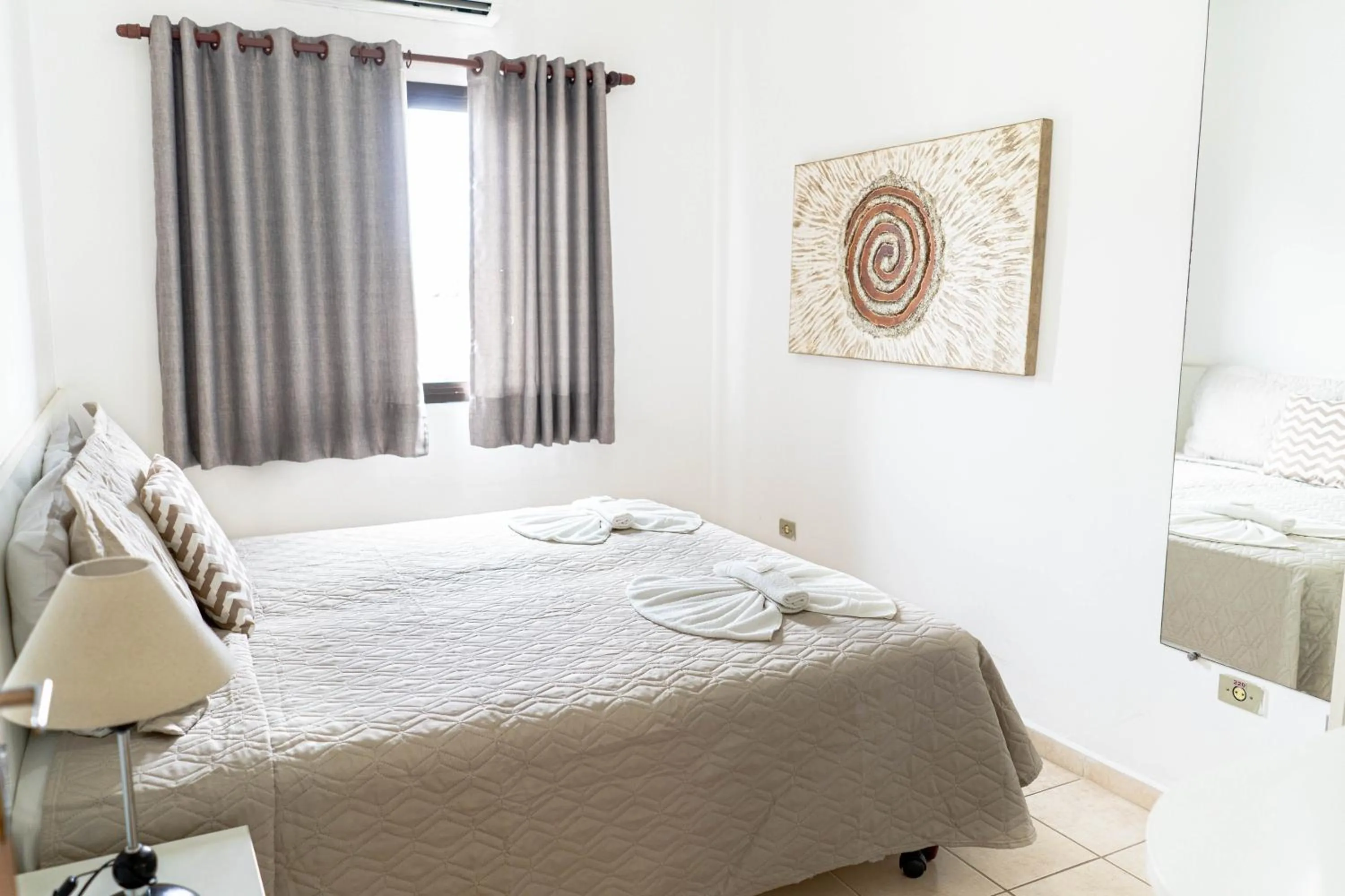 Bed in Bella Casa Flat Service