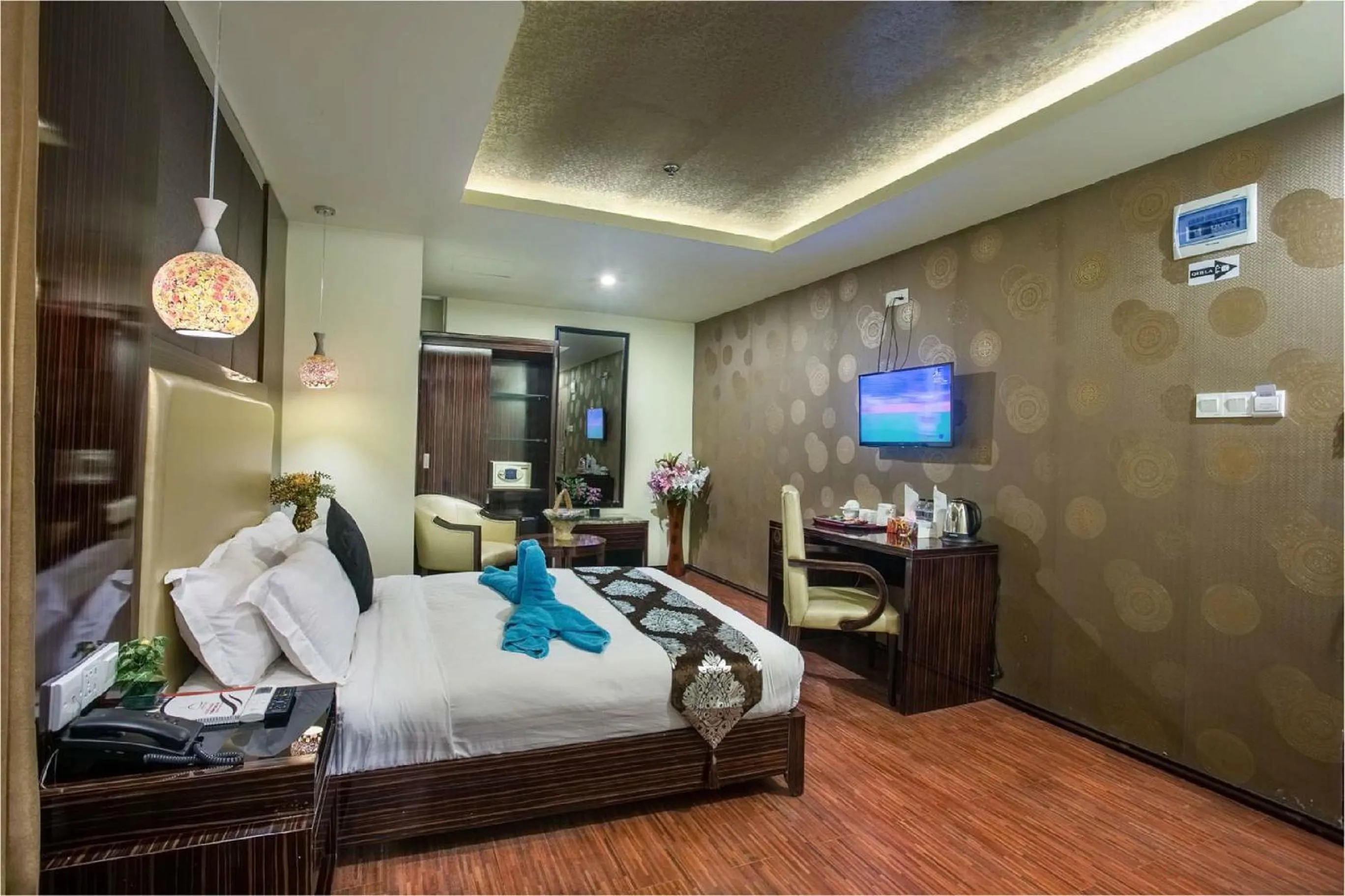 Living room, Bed in Hotel Noorjahan Grand