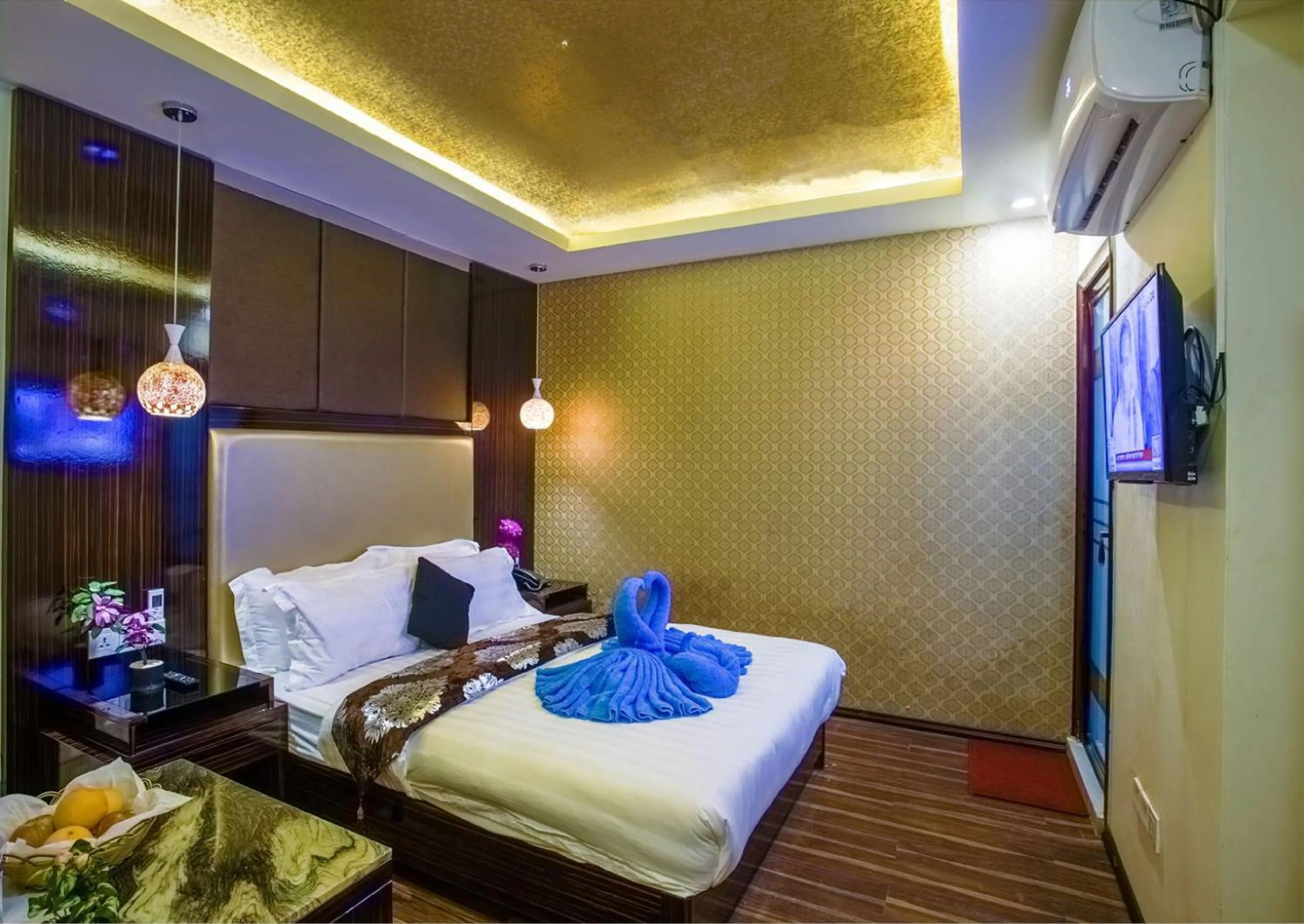 Living room, Bed in Hotel Noorjahan Grand