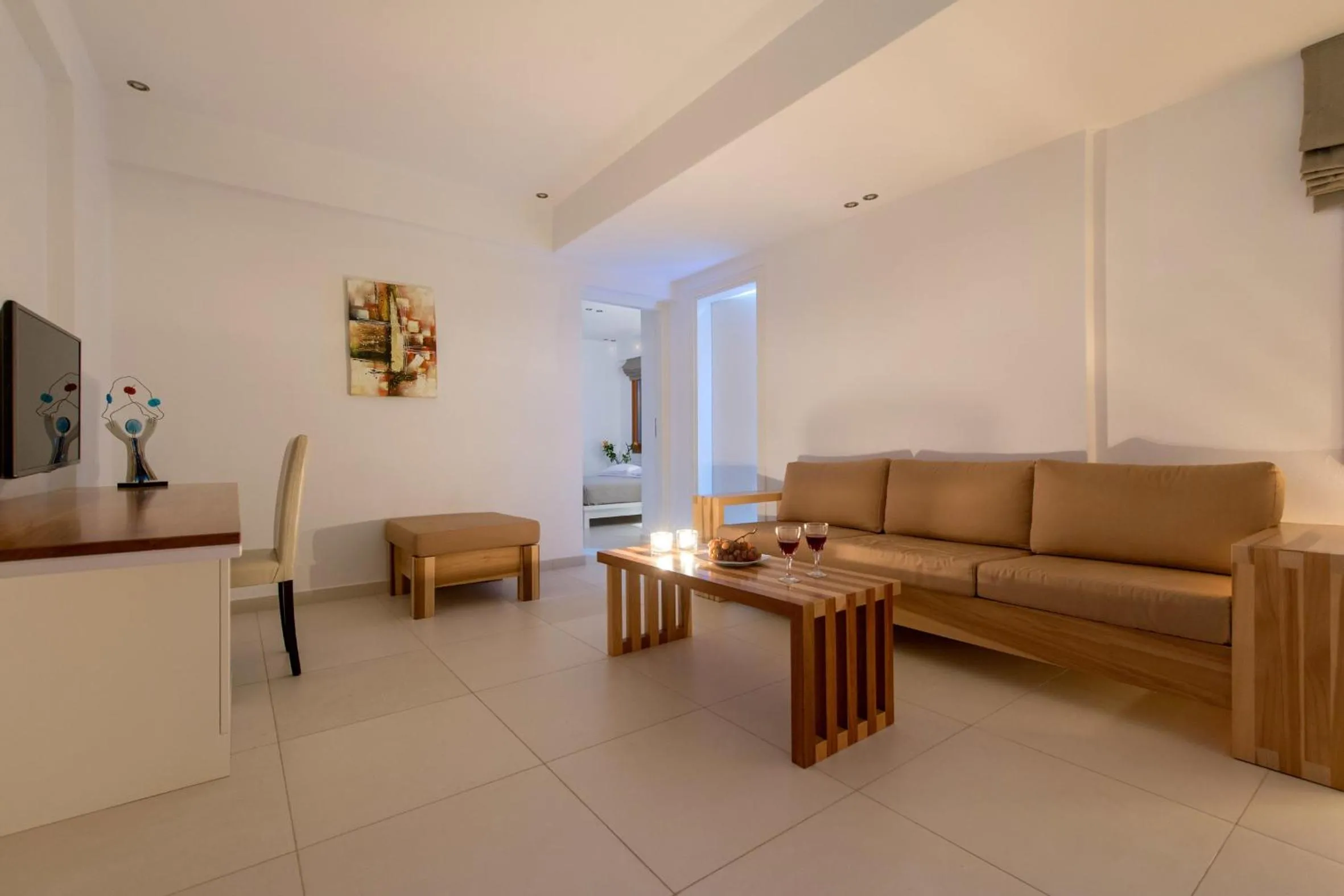 Communal lounge/ TV room in Anamnesis City Spa