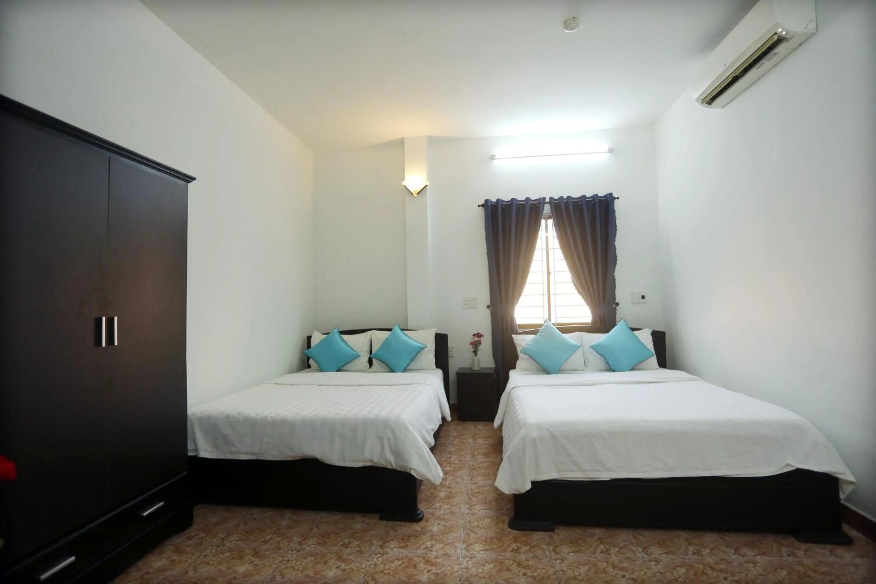 Bed in DaNa Home Hotel - Apartment