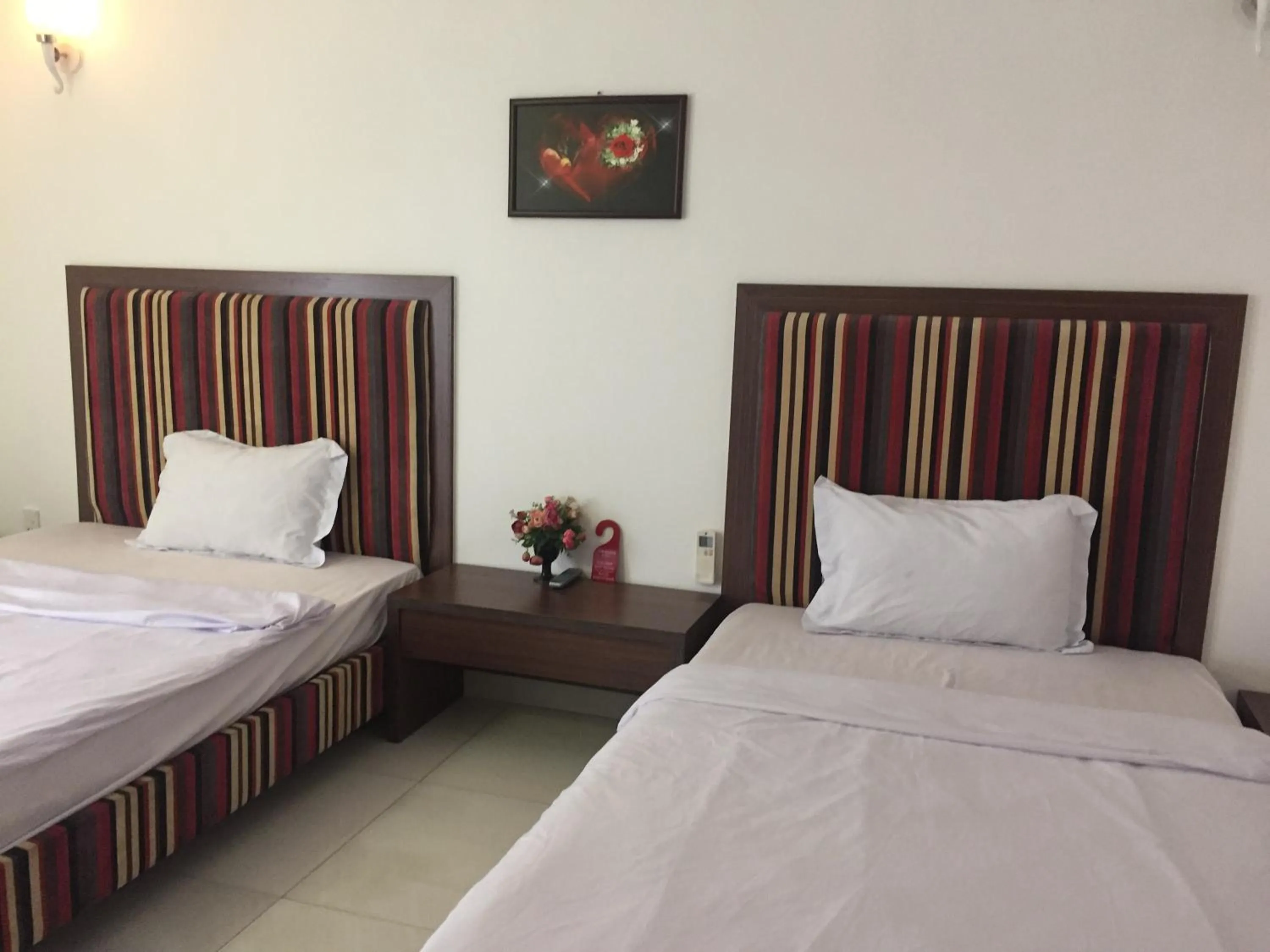 Bed in DaNa Home Hotel - Apartment