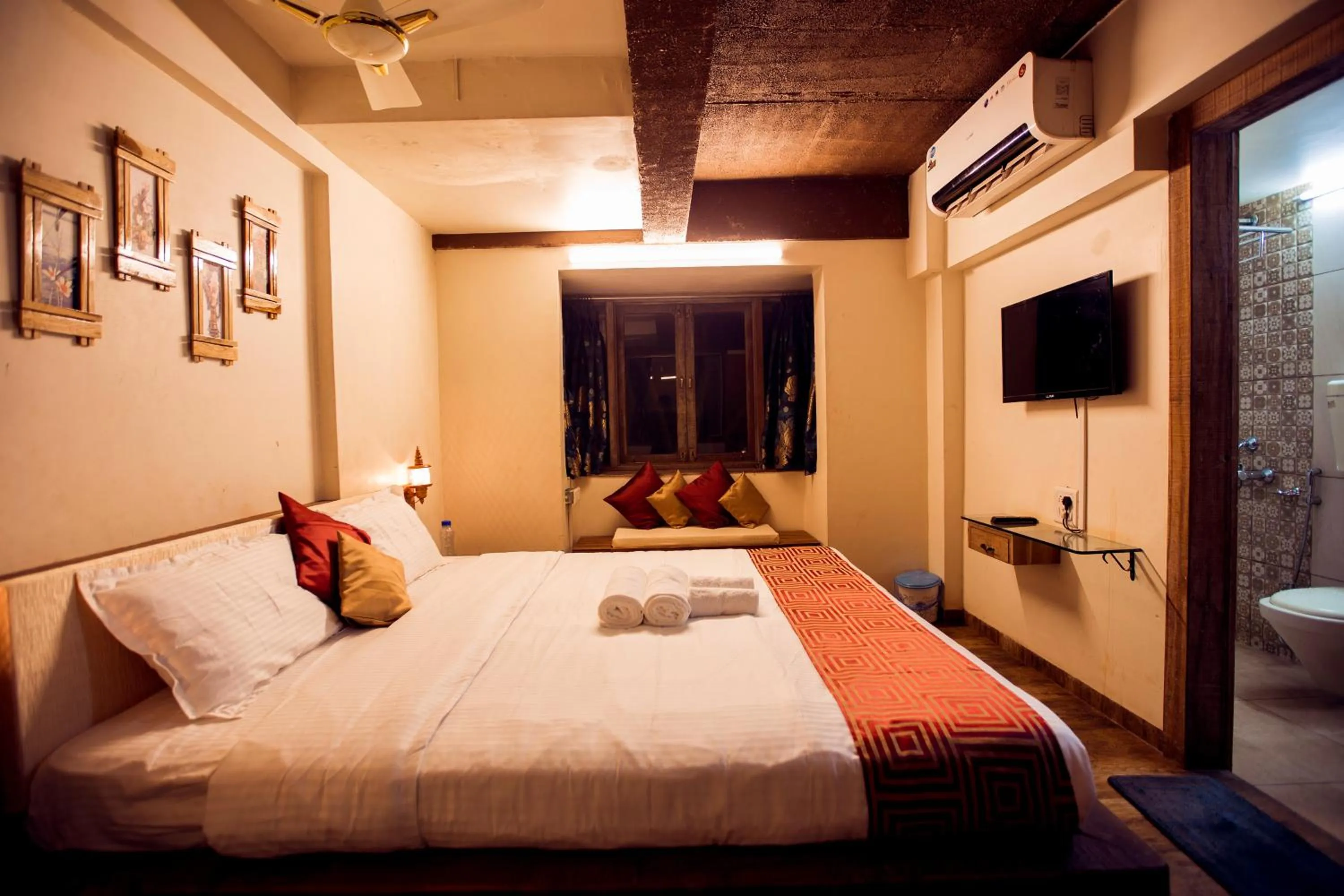 Photo of the whole room, Bed in Kaular Atithis Grand Kokan Resort